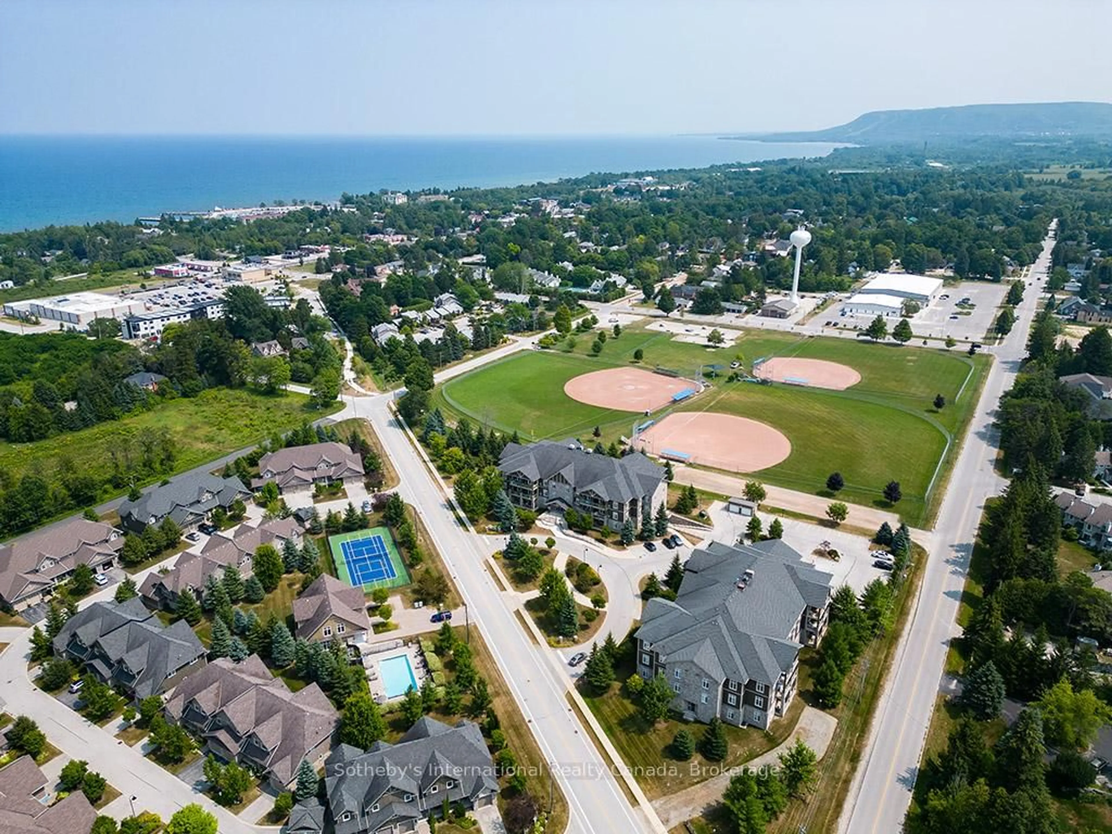 A pic from outside/outdoor area/front of a property/back of a property/a pic from drone, mountain view for 27 Beaver St #101, Blue Mountains Ontario N0H 2P0