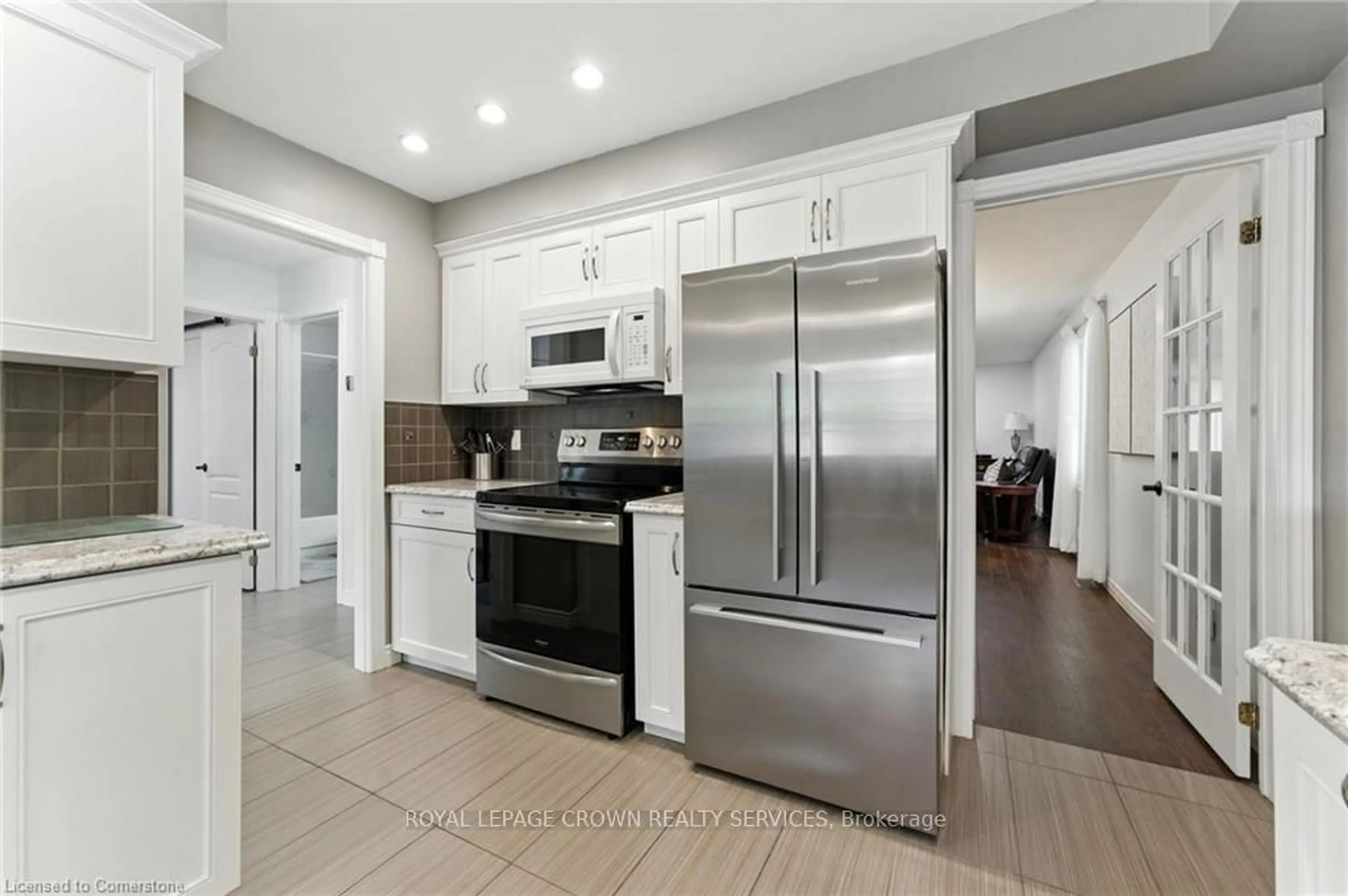 Open concept kitchen, ceramic/tile floor for 75 Beasley Cres #17, Cambridge Ontario N1T 1P5