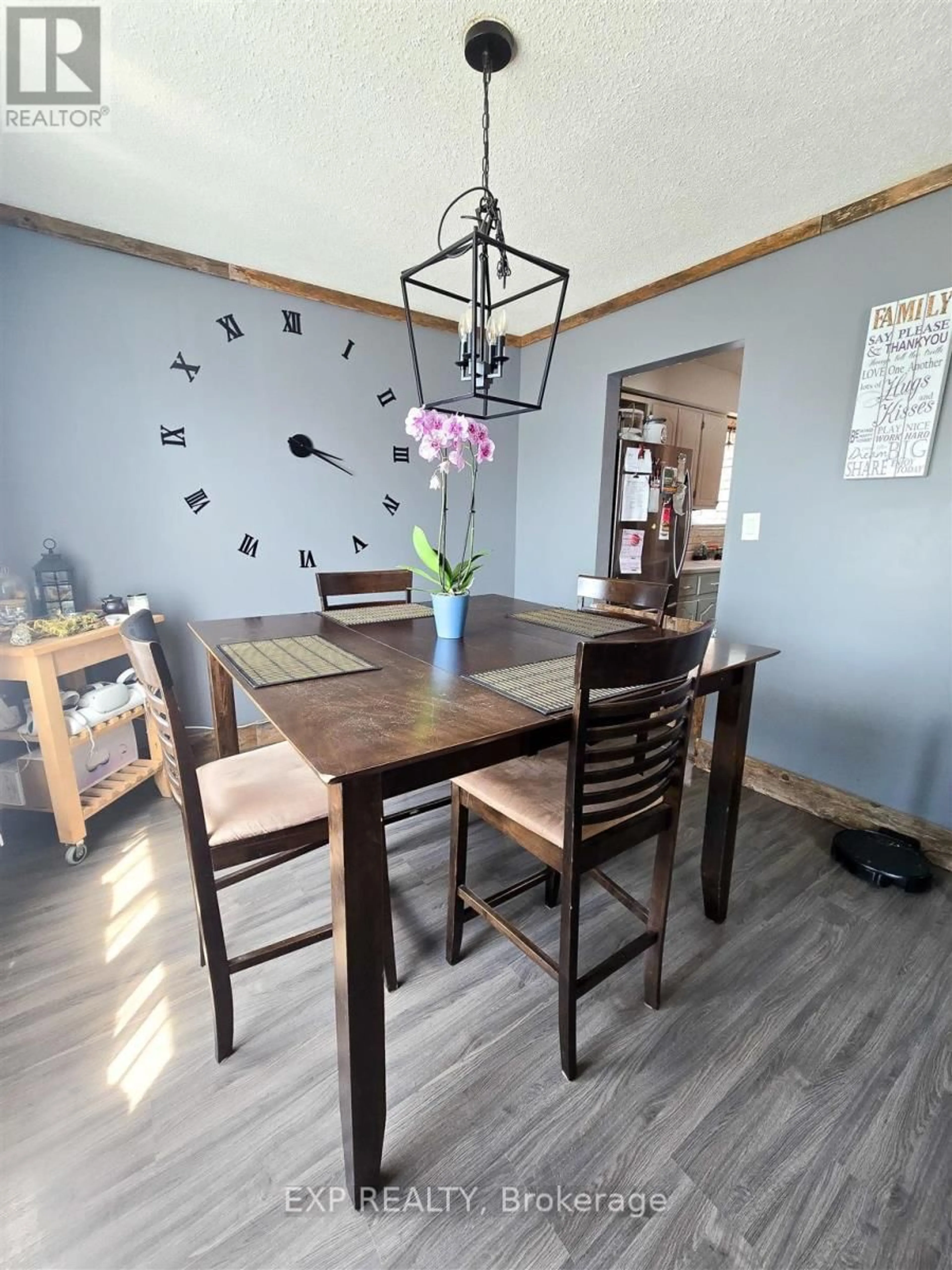 Dining room, wood/laminate floor for 14 Admiral Dr, Sault Ste Marie Ontario P6C 5W3