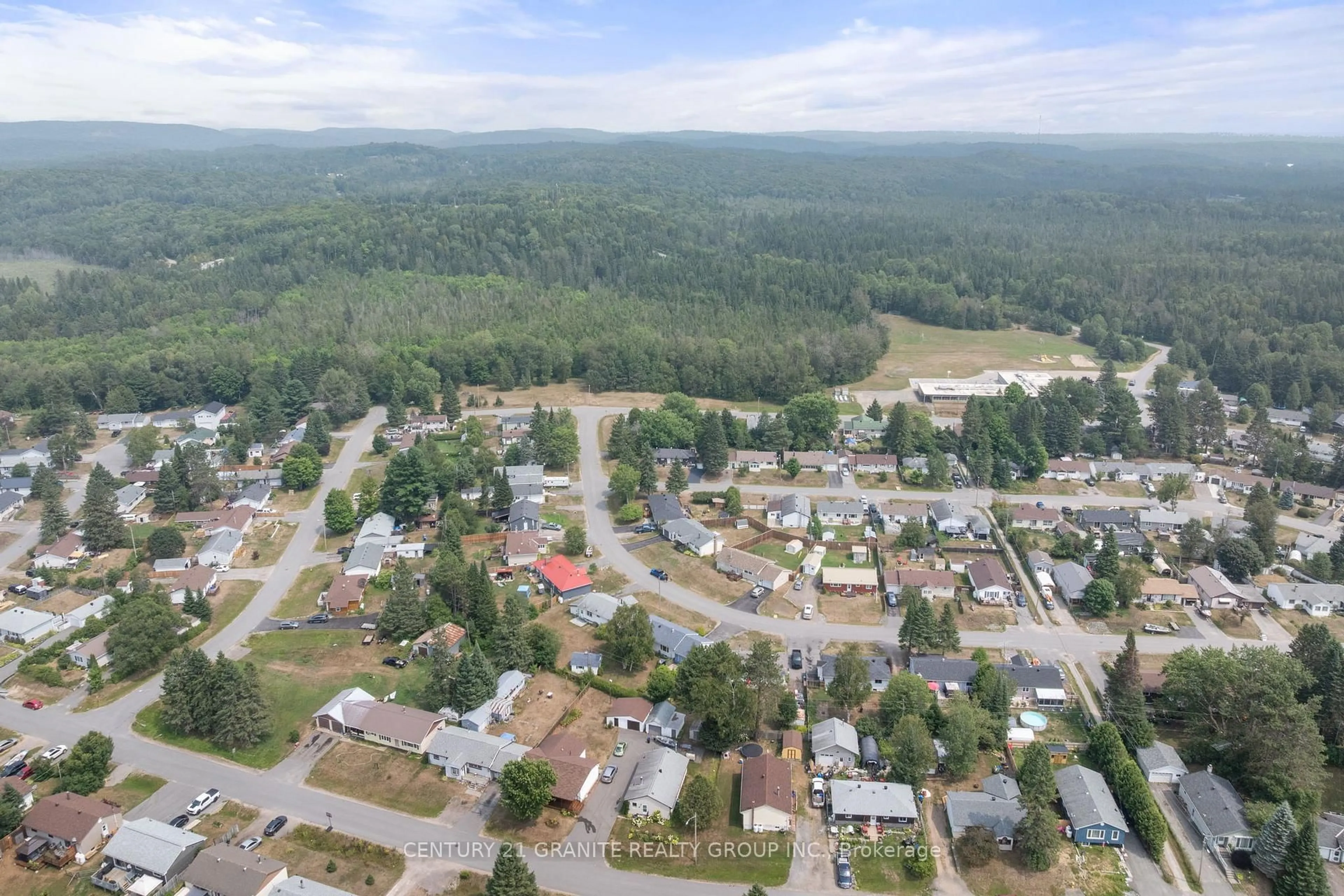 A pic from outside/outdoor area/front of a property/back of a property/a pic from drone, mountain view for 24 Great Oak St, Highlands East Ontario K0L 1M0