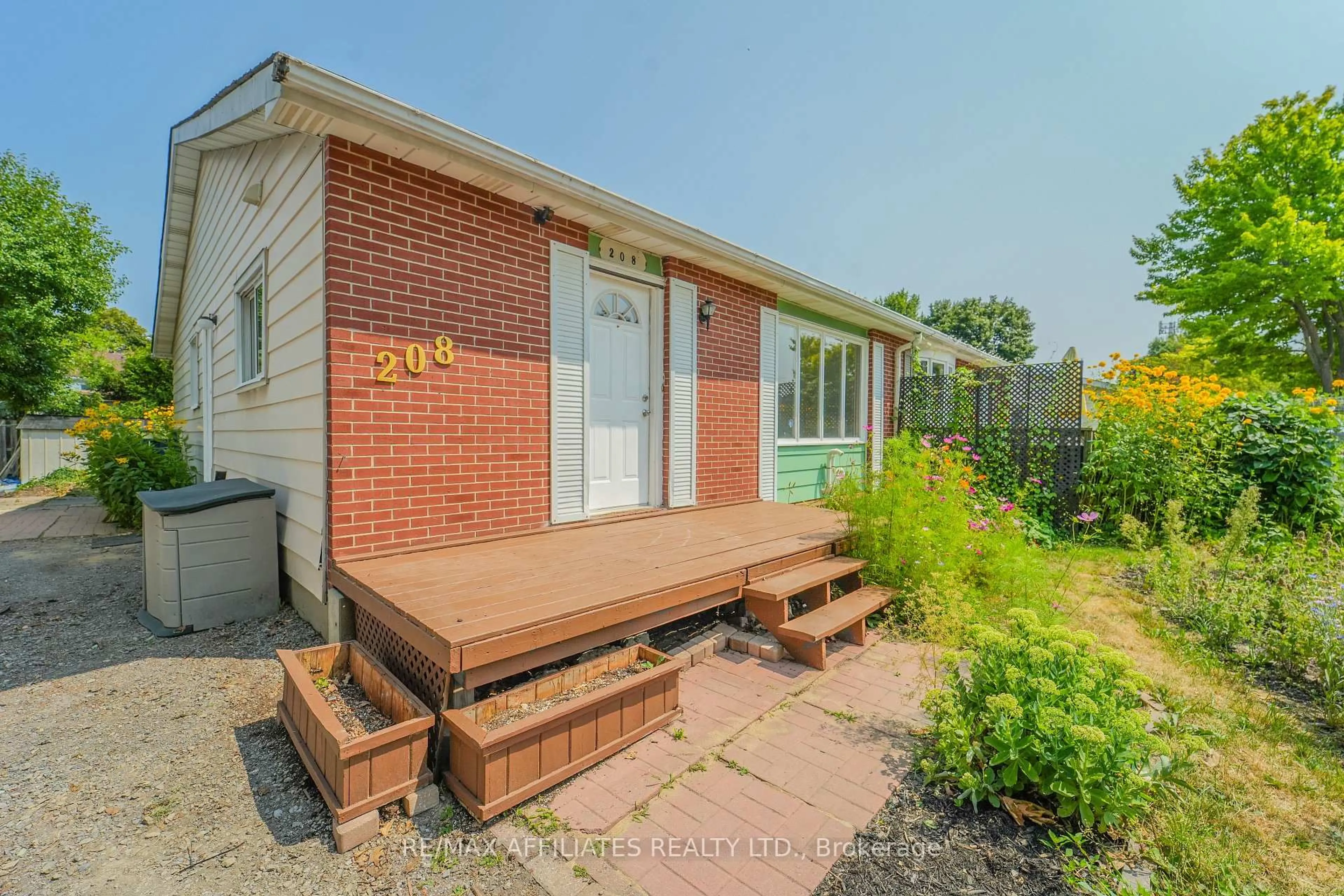 Home with brick exterior material, street for 208 Old Colony Rd, Ottawa Ontario K2L 1M7