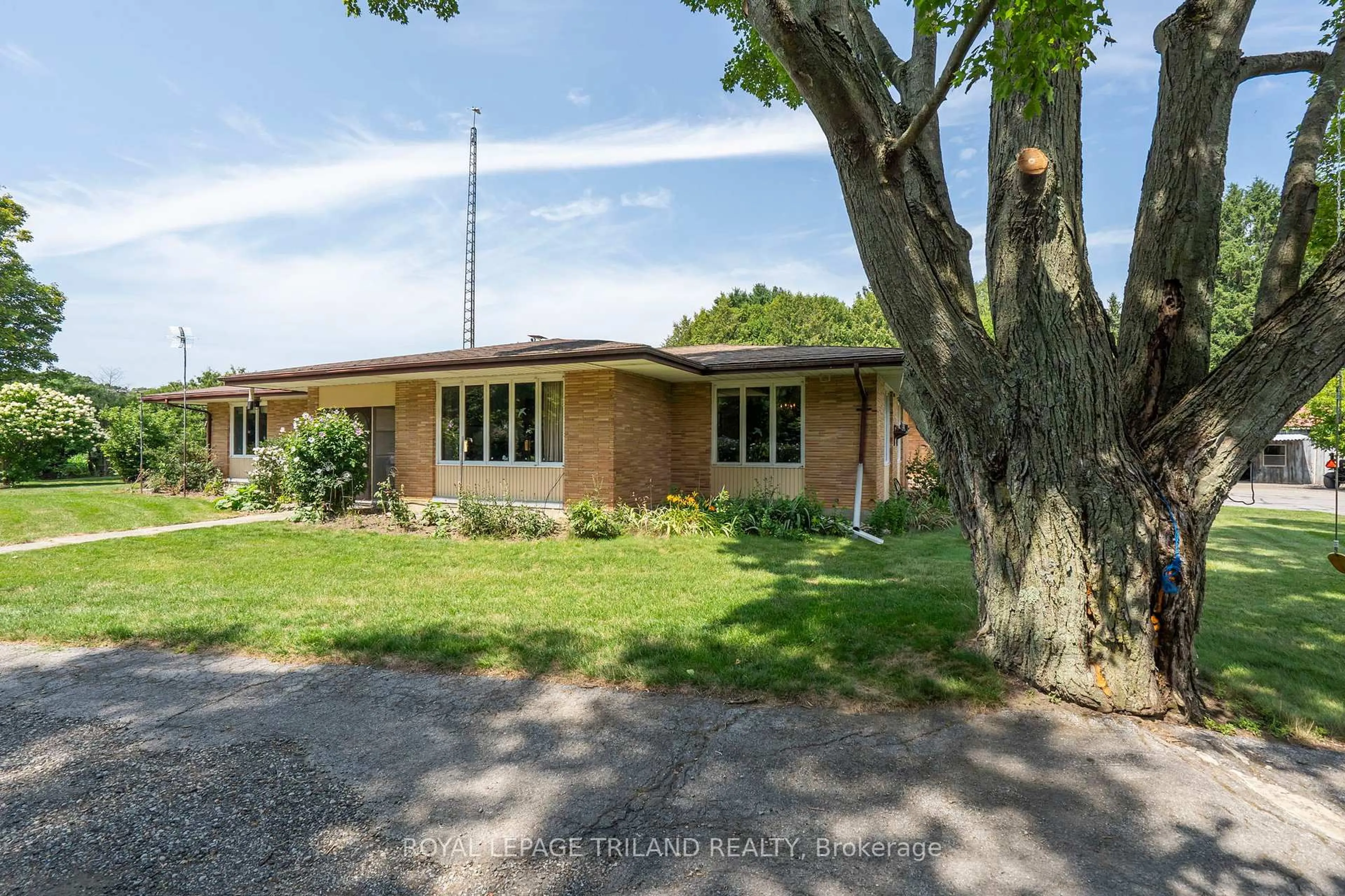 A pic from outside/outdoor area/front of a property/back of a property/a pic from drone, street for 57810 Heritage Line, Bayham Ontario N4G 4G9