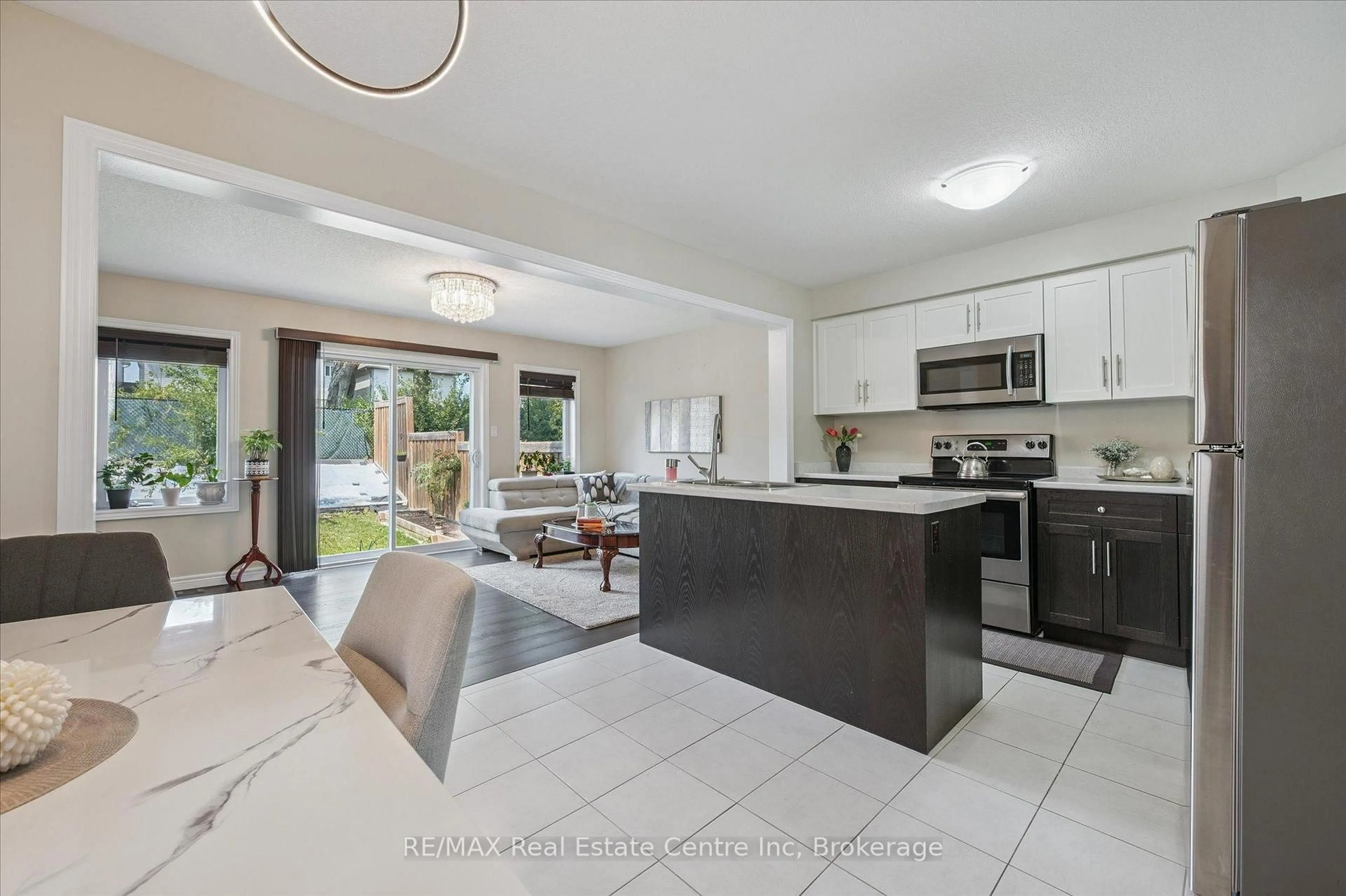 Open concept kitchen, ceramic/tile floor for 23 Ambrous Cres, Guelph Ontario N1G 0G1