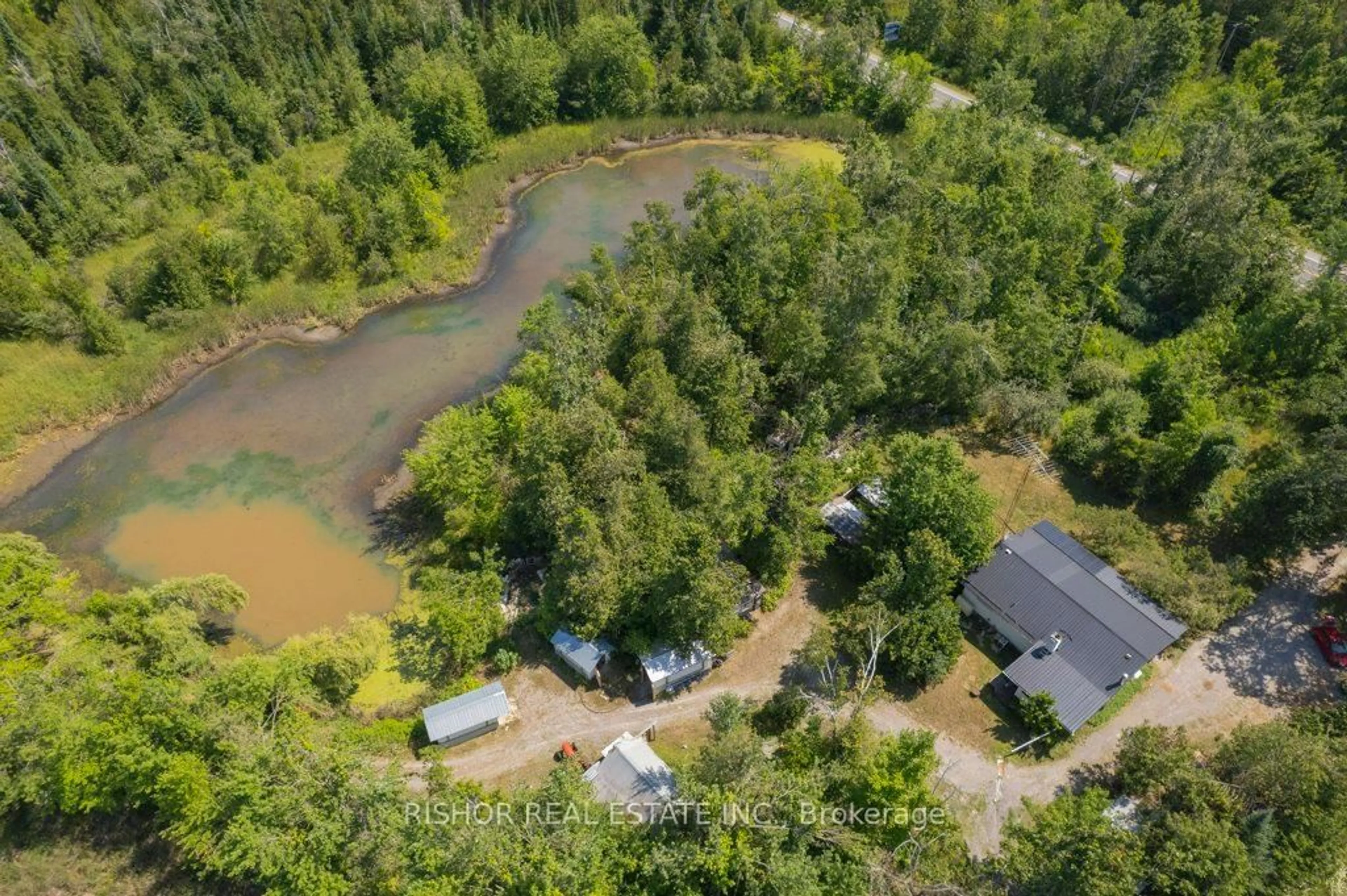 A pic from outside/outdoor area/front of a property/back of a property/a pic from drone, water/lake/river/ocean view for 4478 28 Highway, Selwyn Ontario K0L 2H0
