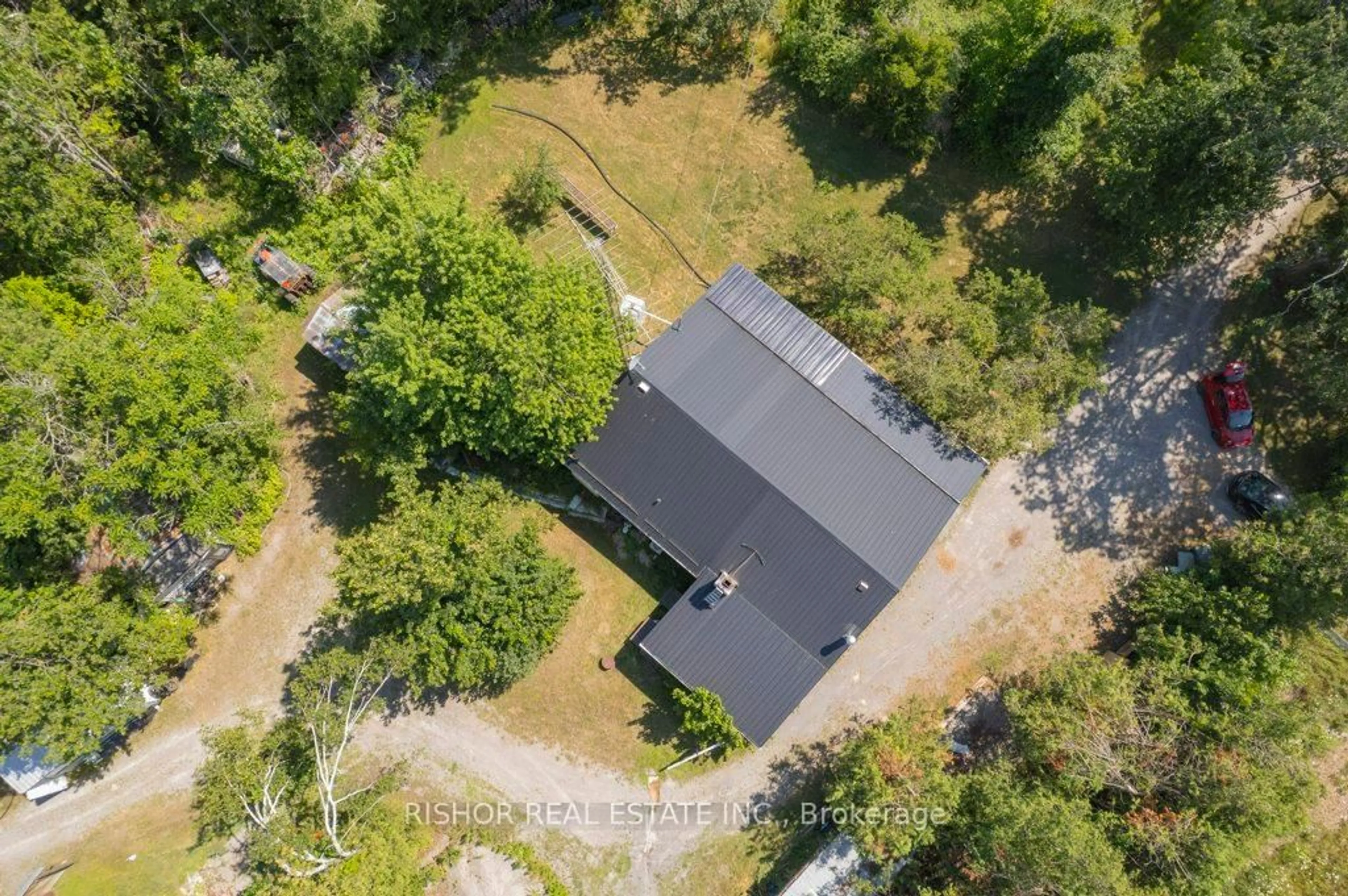 A pic from outside/outdoor area/front of a property/back of a property/a pic from drone, forest/trees view for 4478 28 Highway, Selwyn Ontario K0L 2H0
