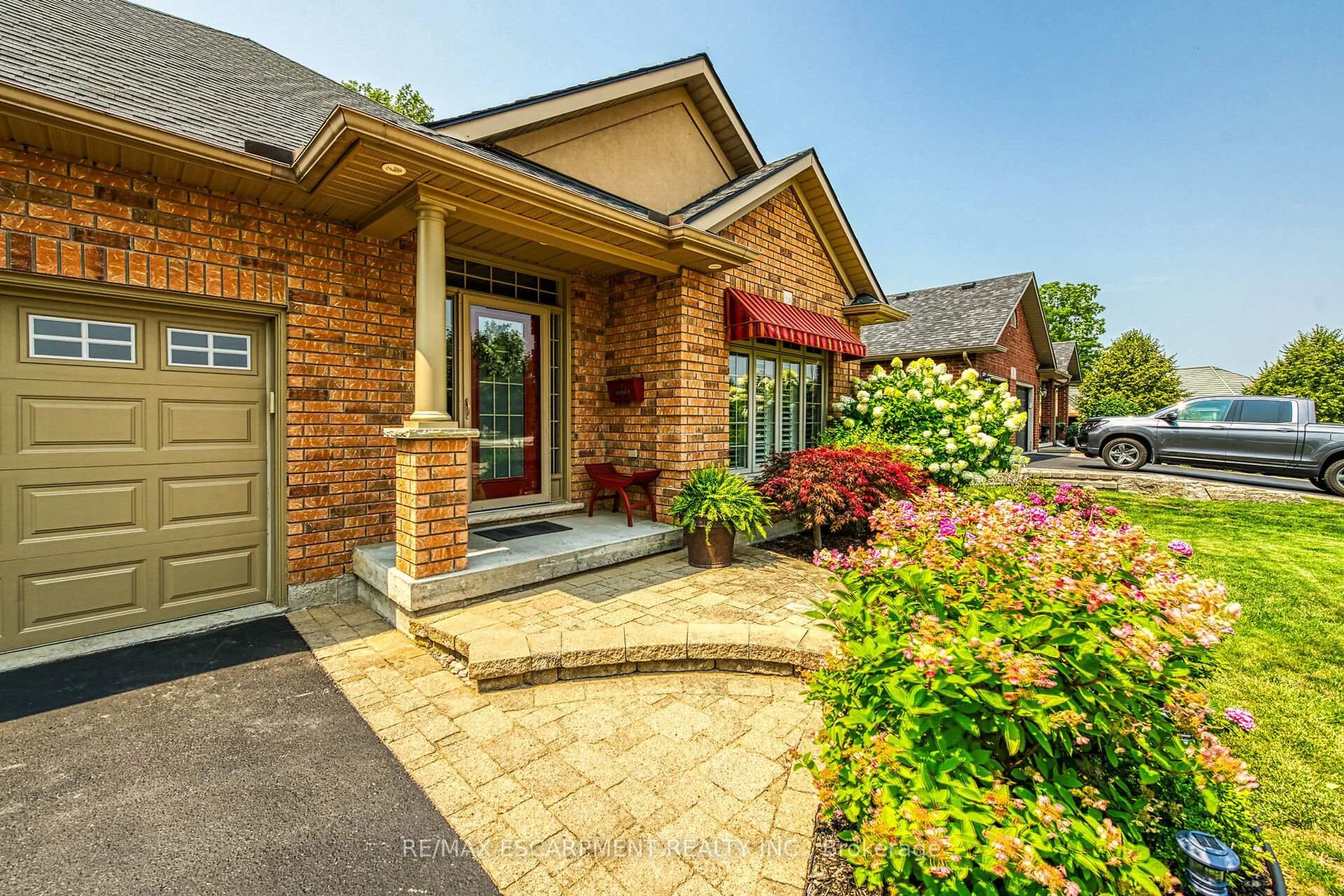 Home with brick exterior material, street for 49 Sea Breeze Dr, Norfolk Ontario N0A 1N7