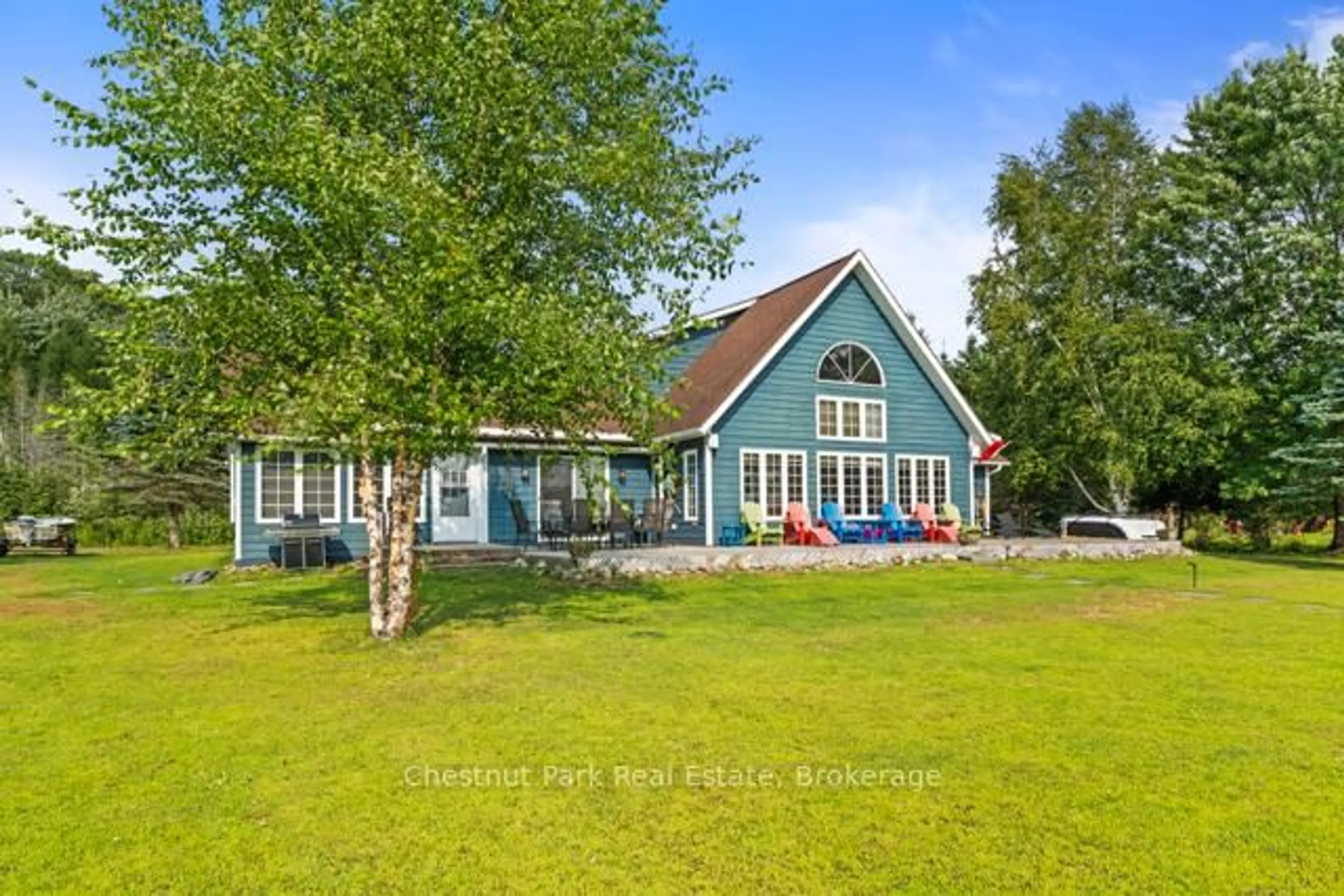 A pic from outside/outdoor area/front of a property/back of a property/a pic from drone, unknown for 82 Seelys Rd, Huntsville Ontario P1H 2J3