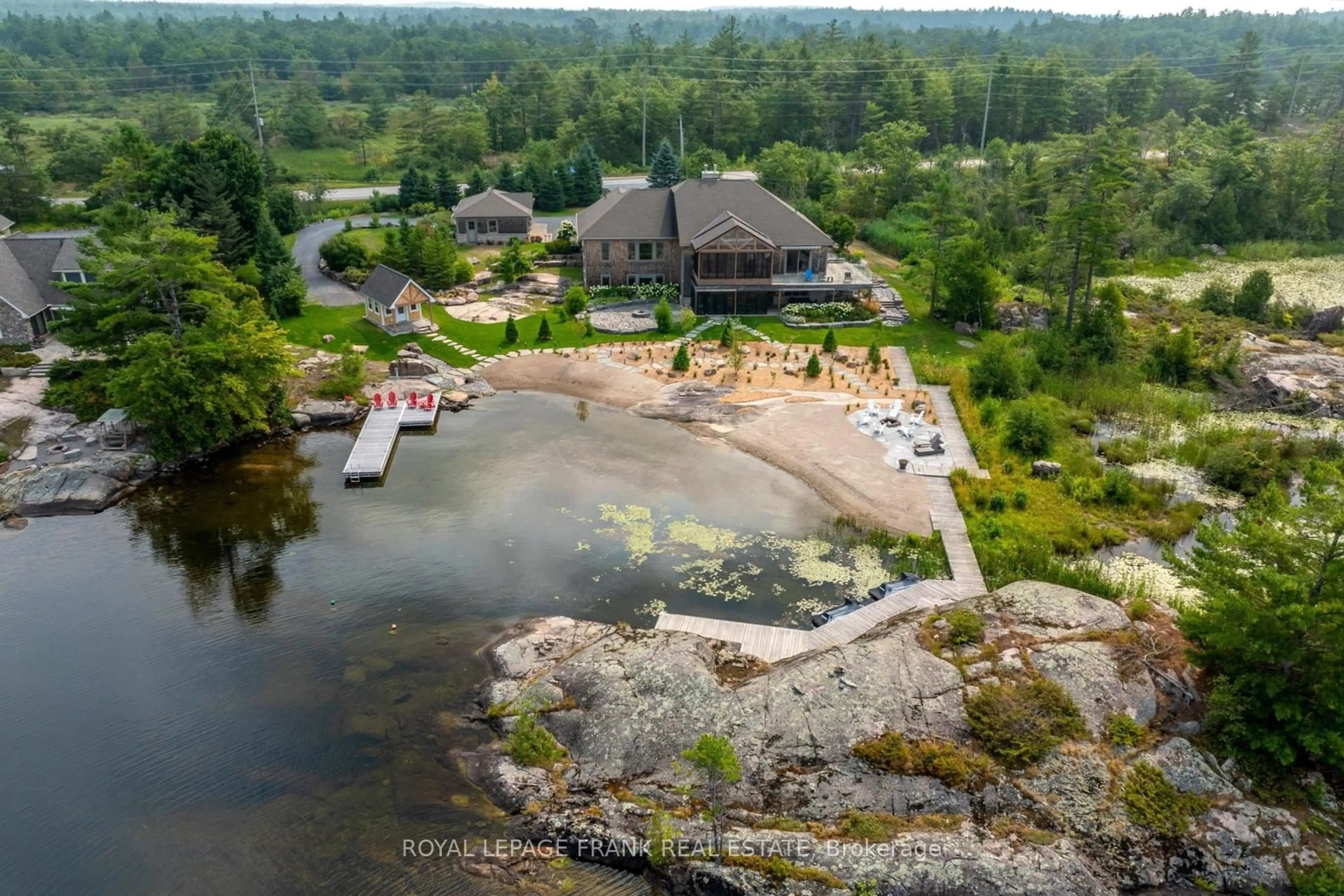 A pic from outside/outdoor area/front of a property/back of a property/a pic from drone, water/lake/river/ocean view for 3790 County Road 6, North Kawartha Ontario K0L 3E0