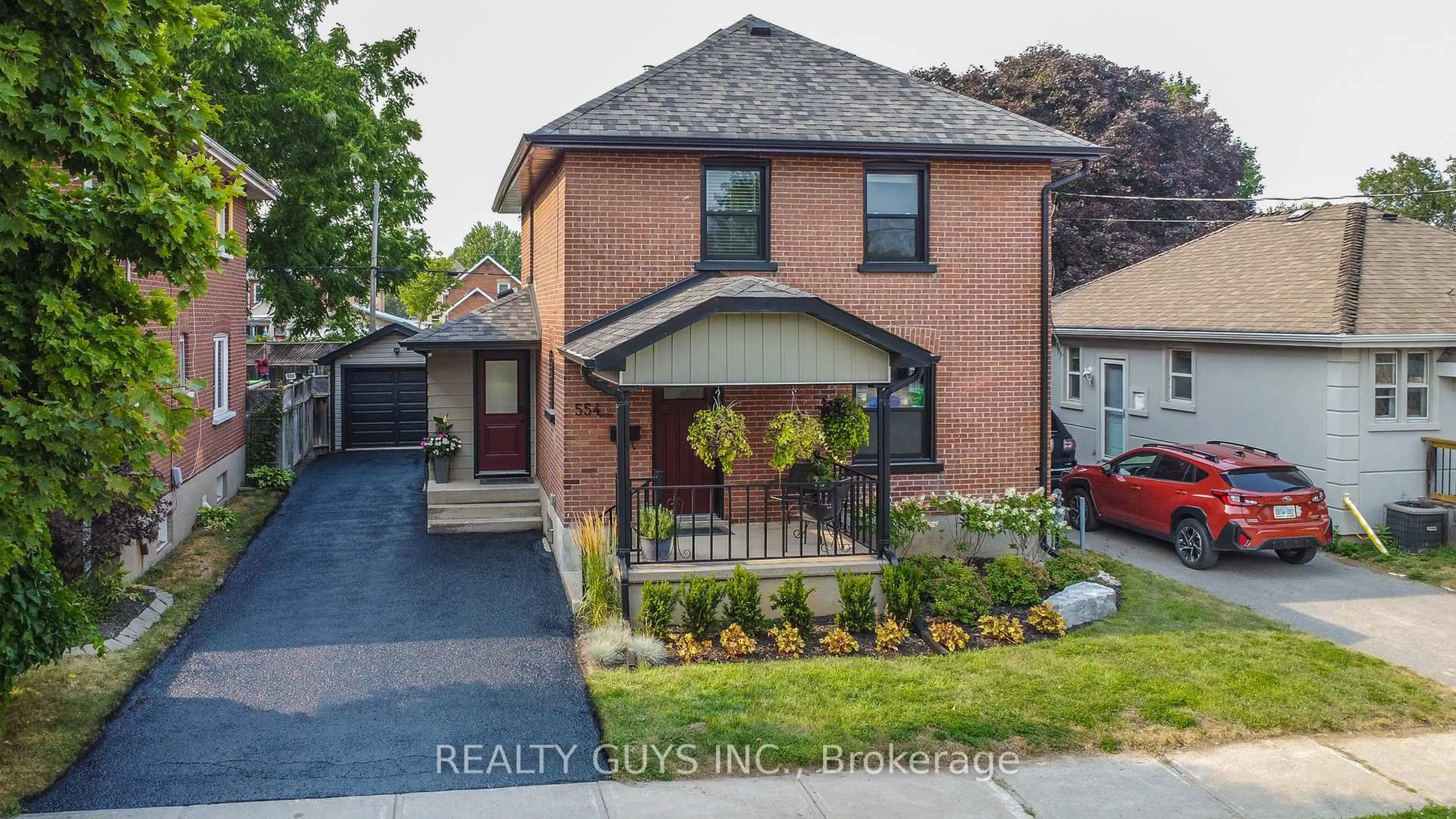 Home with brick exterior material, street for 554 Douglas Ave, Peterborough Central Ontario K9J 4L1