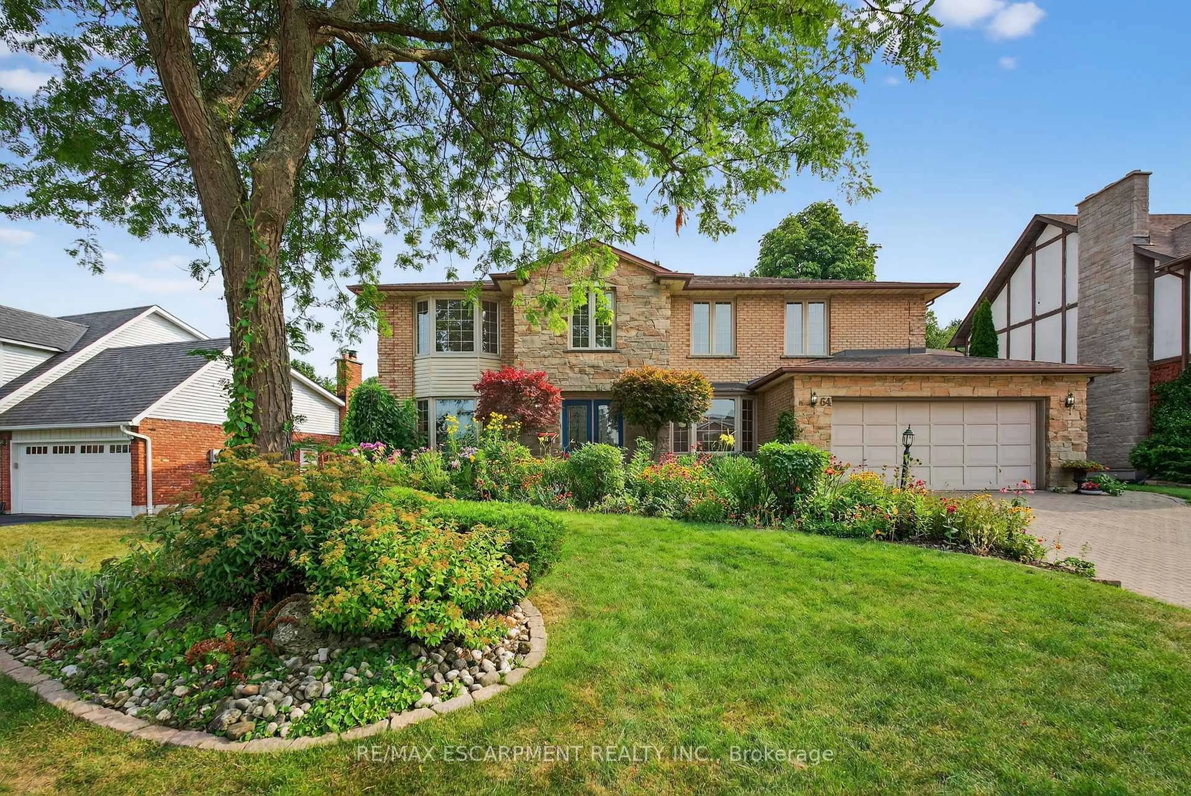 Home with brick exterior material, street for 64 Summerdale Pl, Hamilton Ontario L9G 3Z7