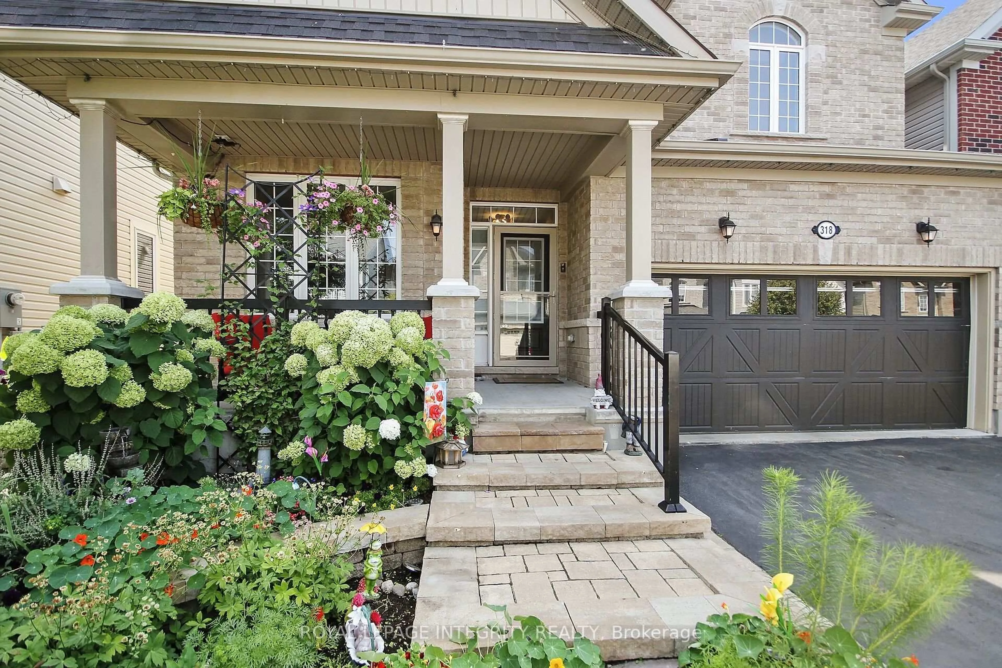 Home with brick exterior material, street for 318 Everglade Way, Ottawa Ontario K2M 0K9