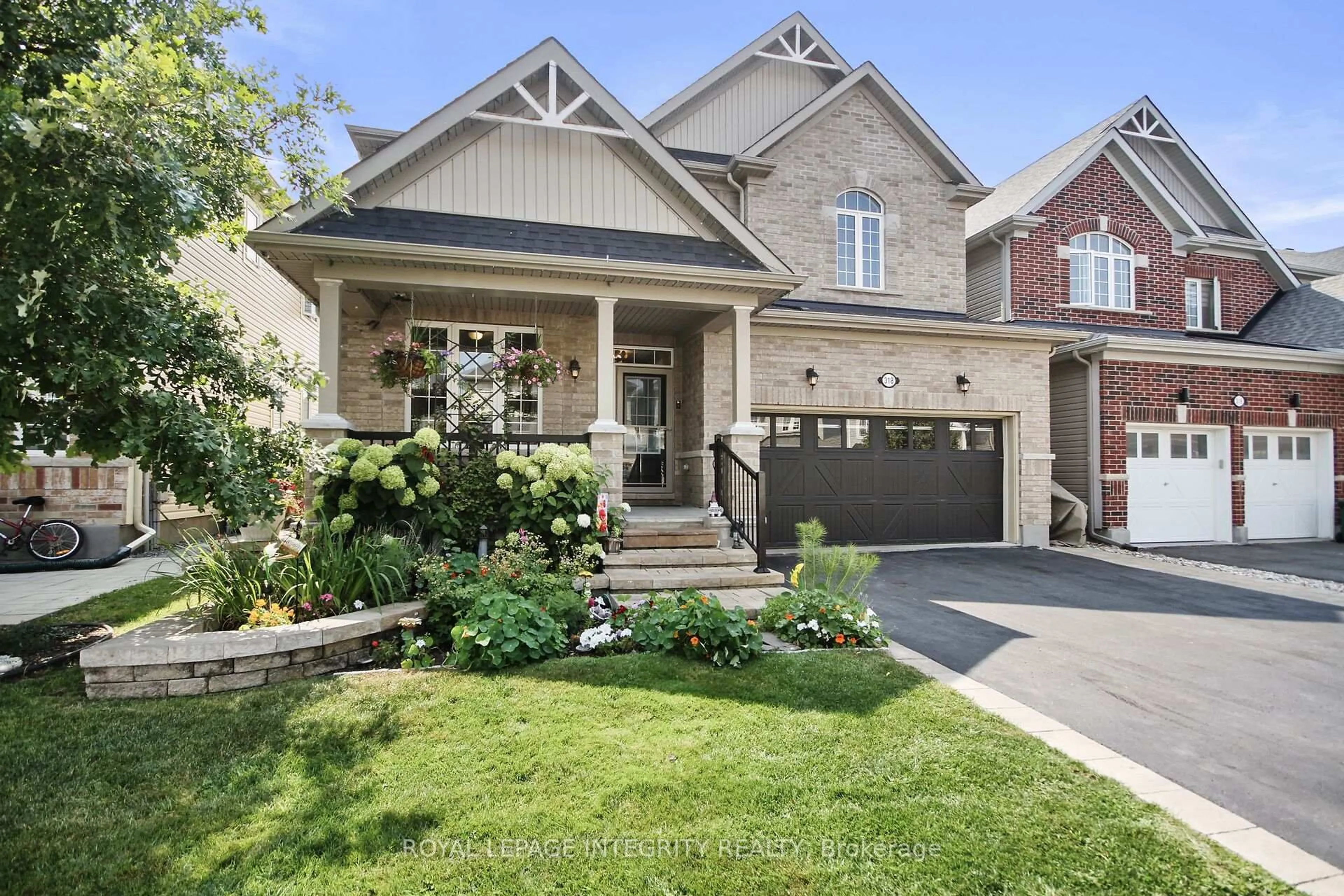 Home with brick exterior material, street for 318 Everglade Way, Ottawa Ontario K2M 0K9