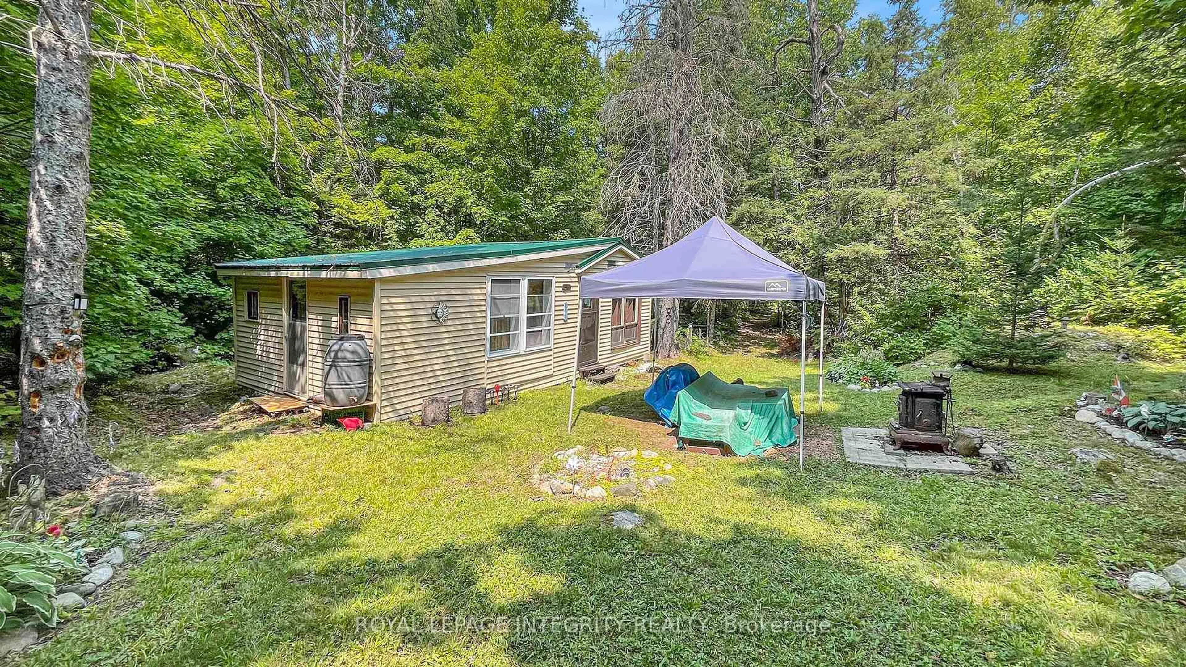 A pic from outside/outdoor area/front of a property/back of a property/a pic from drone, forest/trees view for 356 Bow Lake Lane, Lanark Ontario K0G 1K0