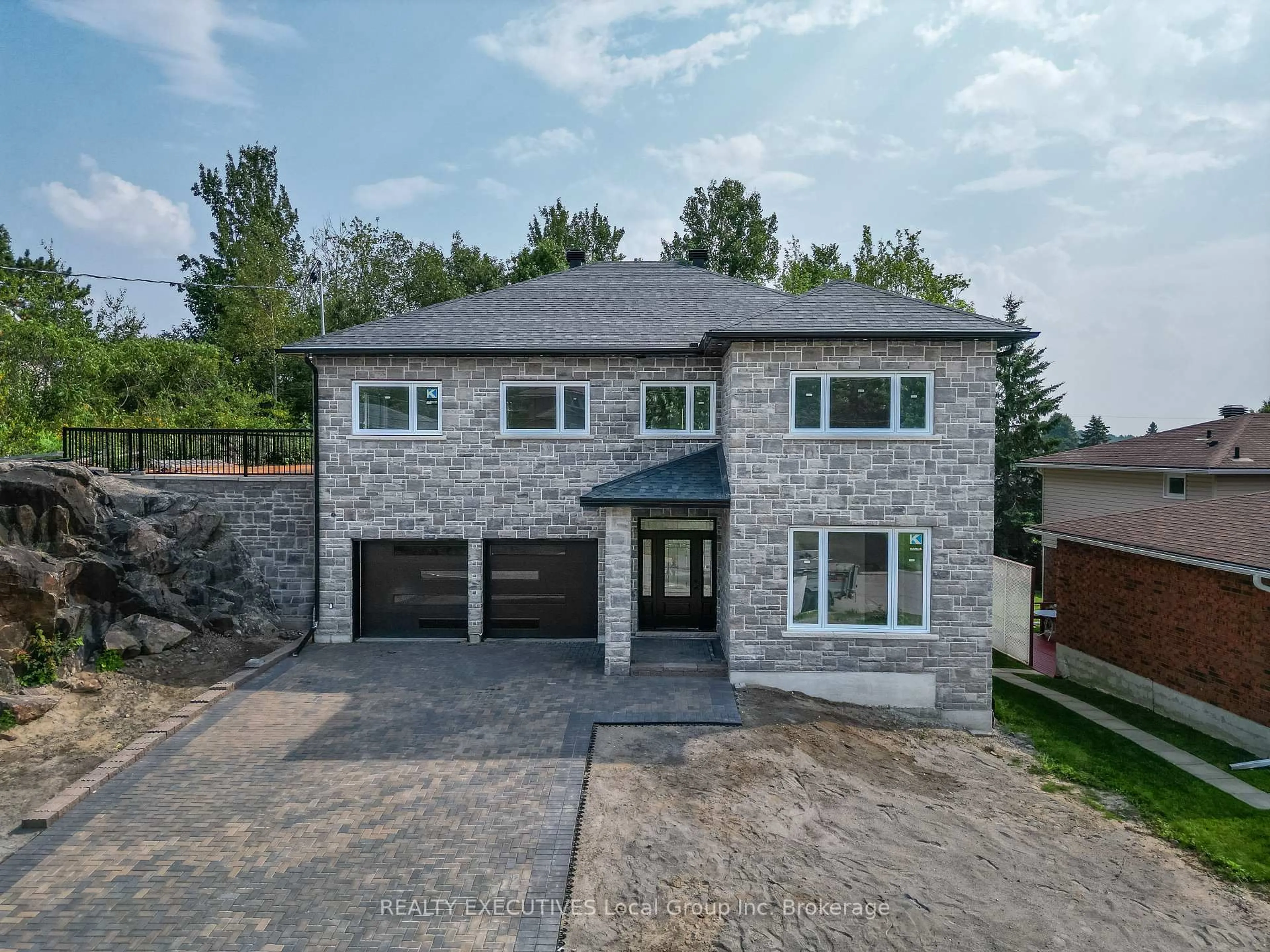 Home with brick exterior material, street for 29 Shallot Cres, North Bay Ontario P1A 3V7