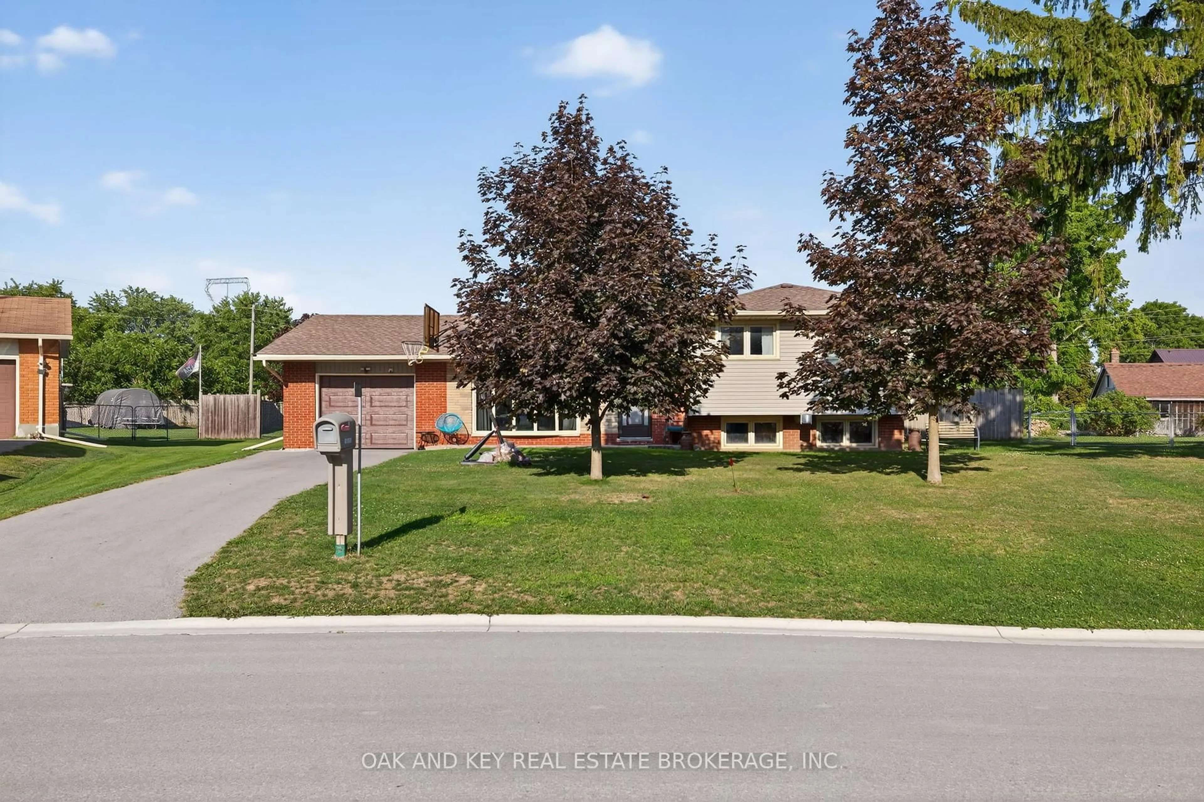 A pic from outside/outdoor area/front of a property/back of a property/a pic from drone, street for 10103 Lynhurst Park Dr, Southwold Ontario N5P 2E5
