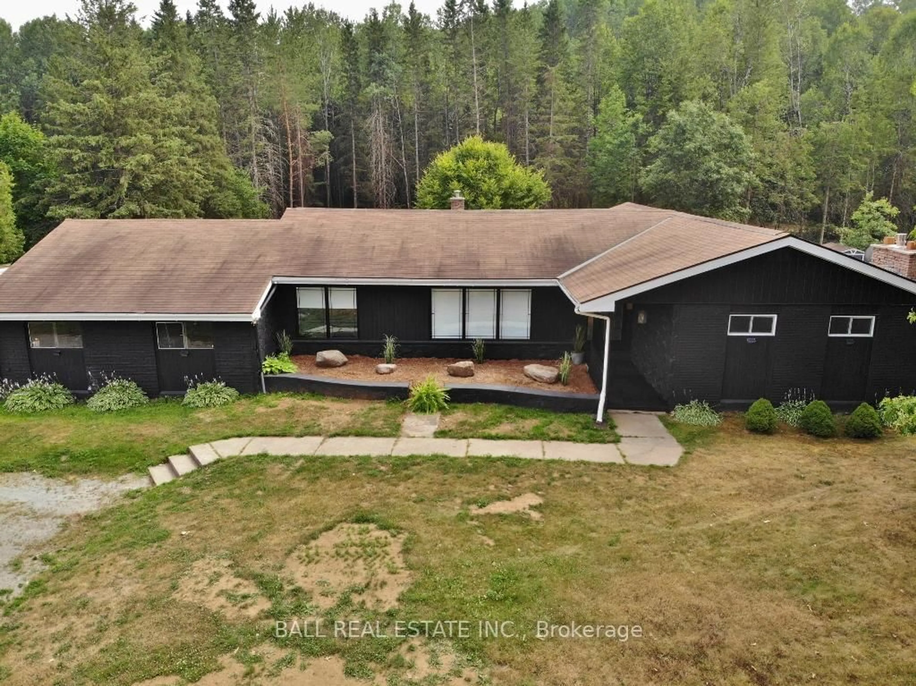 A pic from outside/outdoor area/front of a property/back of a property/a pic from drone, forest/trees view for 20 Musclow-Greenview Rd, Bancroft Ontario K0L 1C0