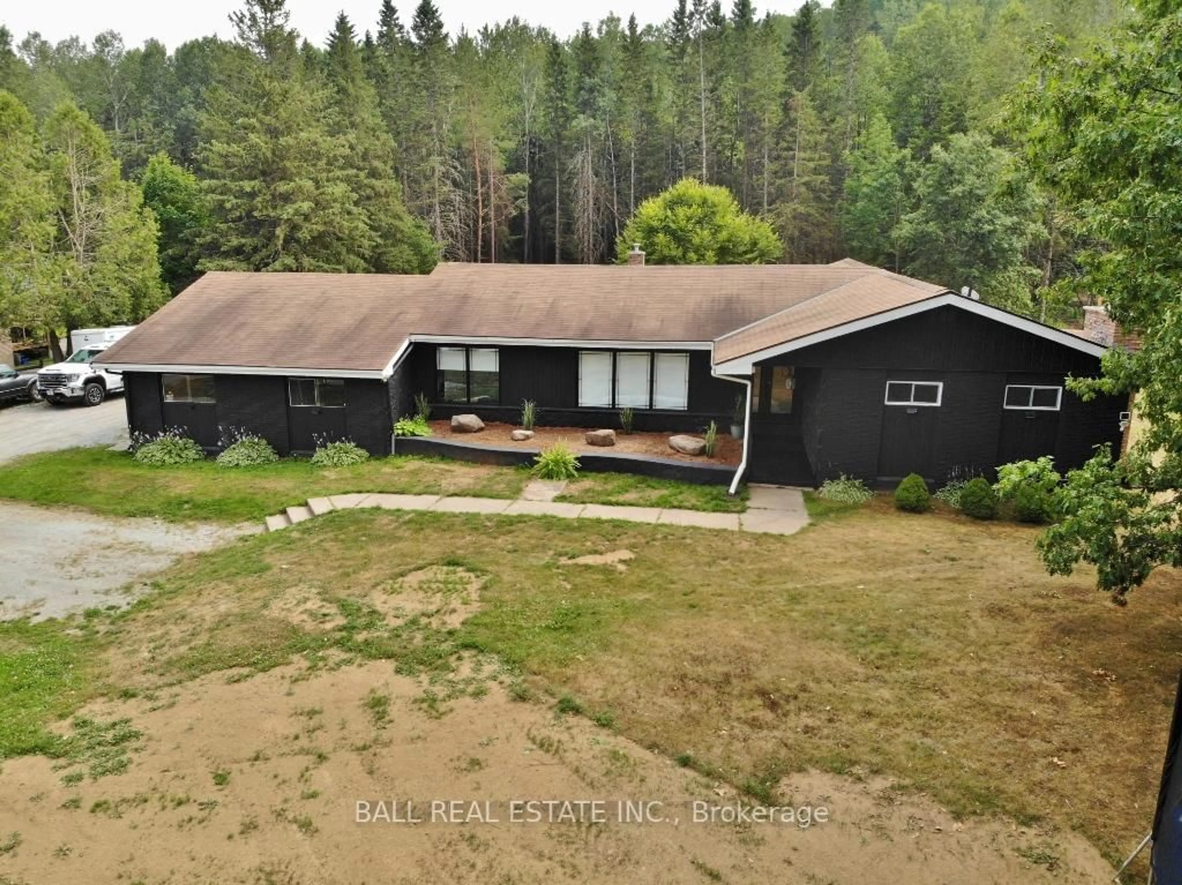 A pic from outside/outdoor area/front of a property/back of a property/a pic from drone, forest/trees view for 20 Musclow-Greenview Rd, Bancroft Ontario K0L 1C0