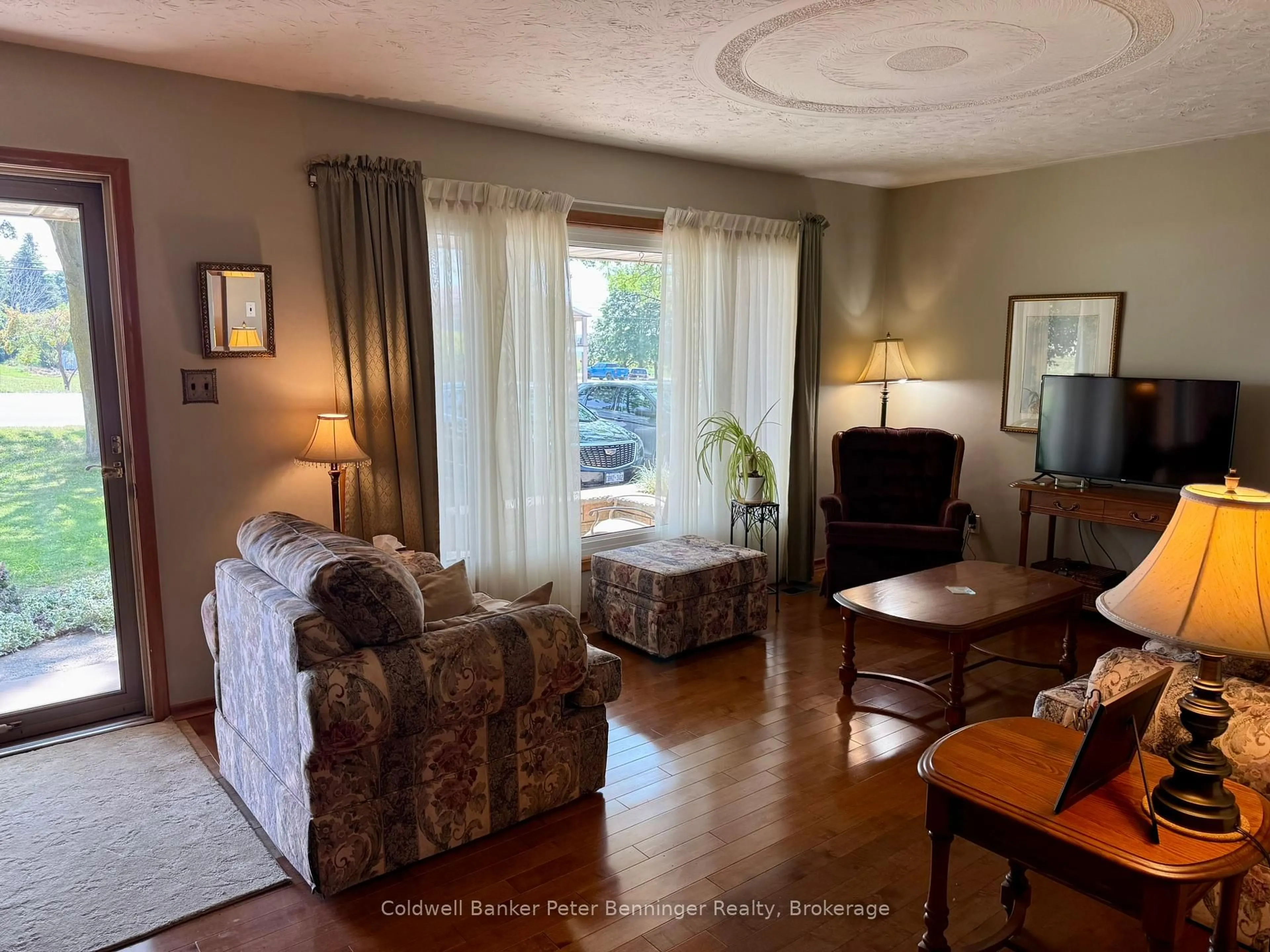 Living room with furniture, wood/laminate floor for 1582 Bruce 4 RR #4, Brockton Ontario N0G 2V0