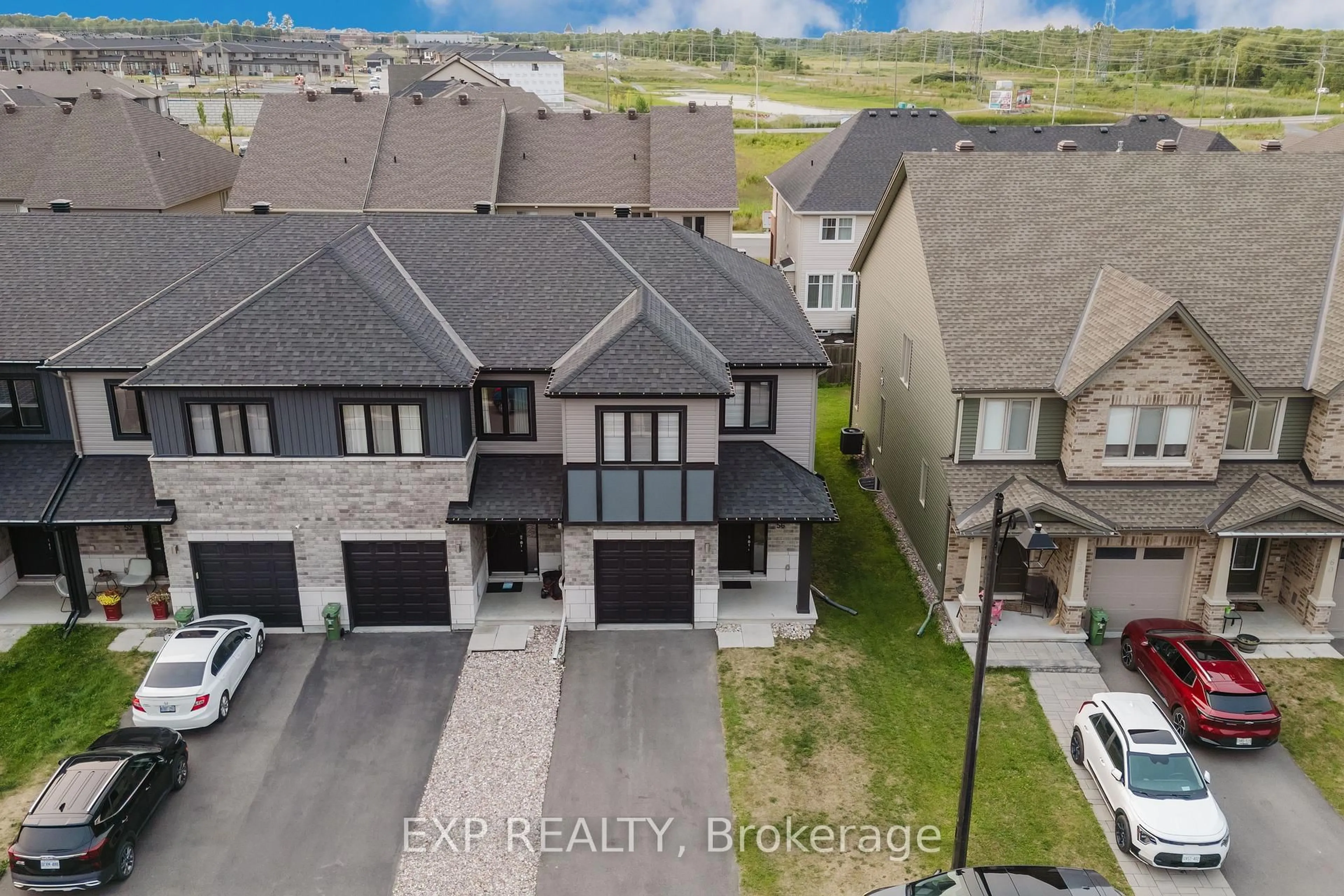 A pic from outside/outdoor area/front of a property/back of a property/a pic from drone, unknown for 56 Jardiniere St, Ottawa Ontario K2S 2K3