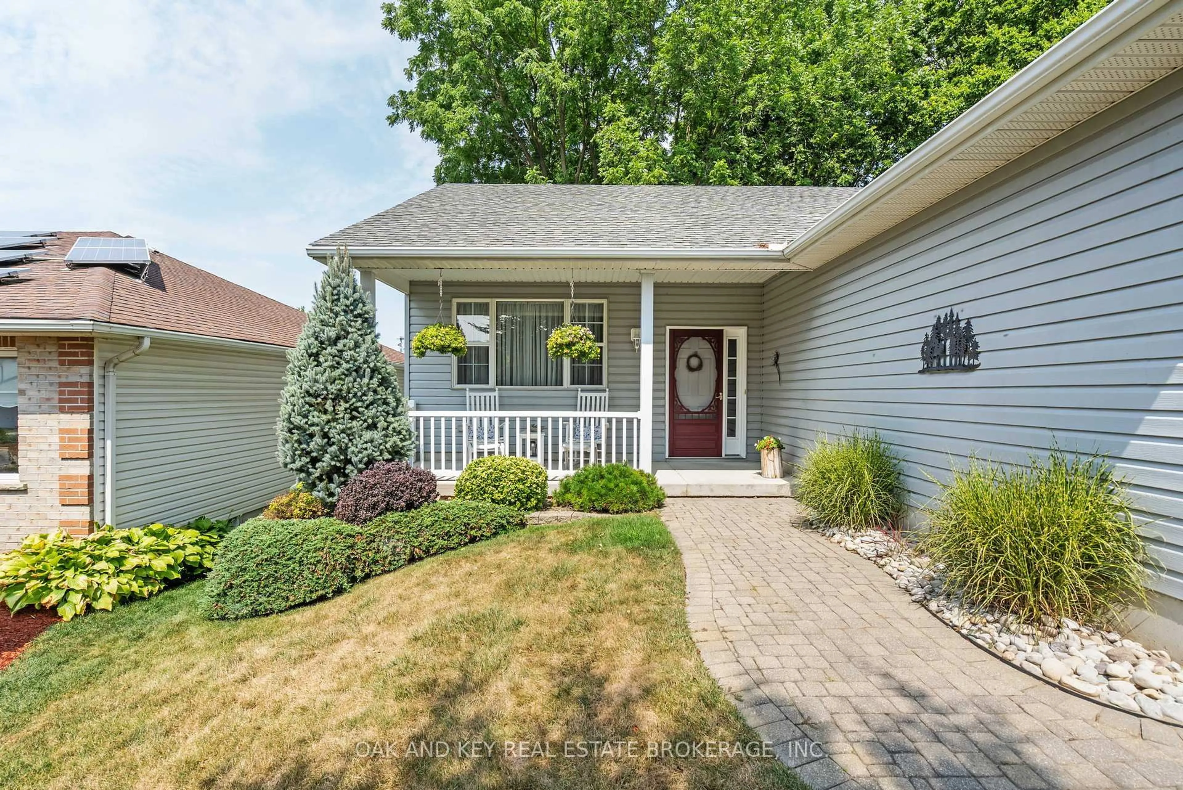 Home with vinyl exterior material, street for 56 Rossiter Rd, Ingersoll Ontario N5C 4E1