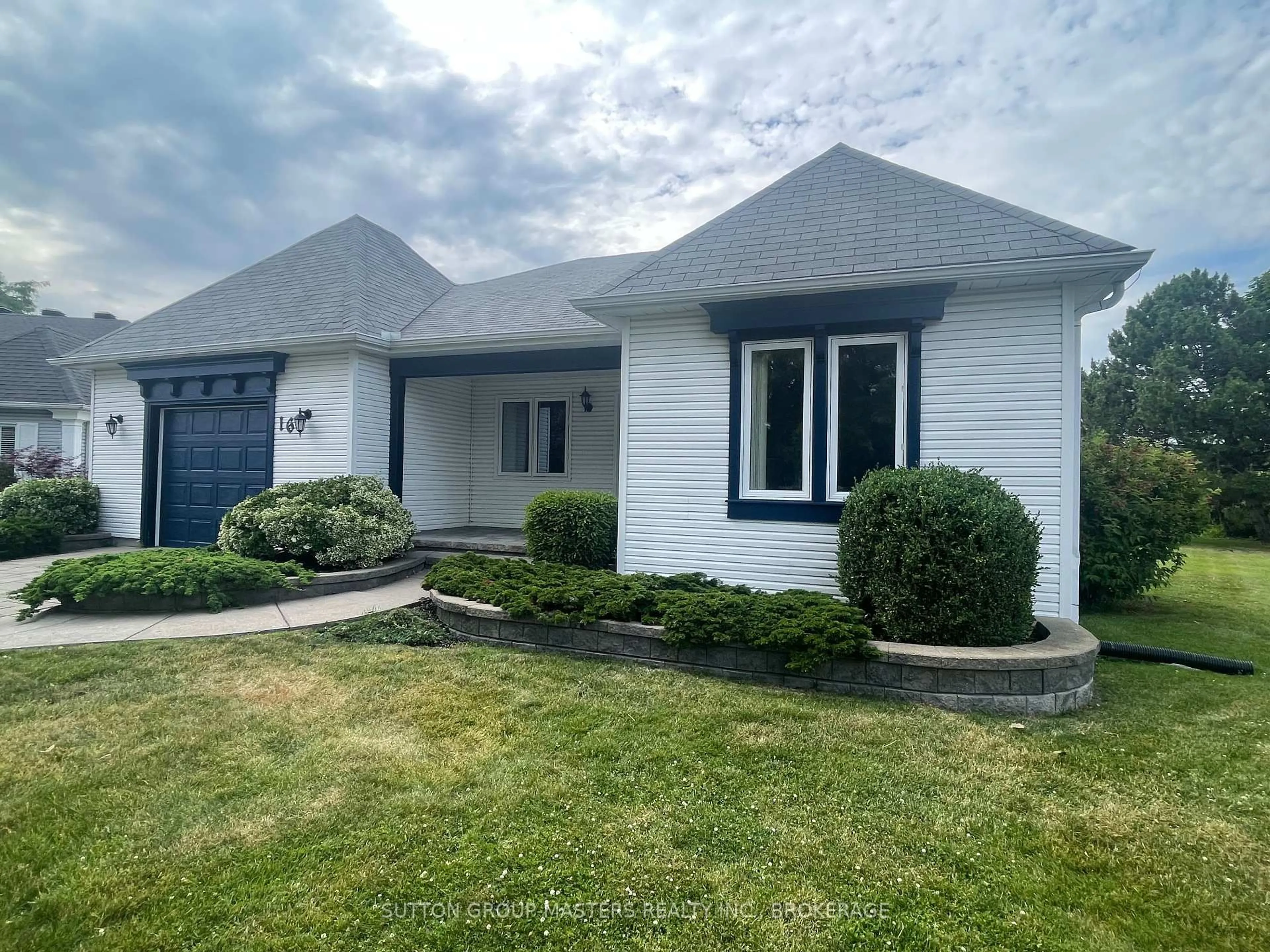 Home with vinyl exterior material, street for 16 King's Crt, Bath Ontario K0H 1G0