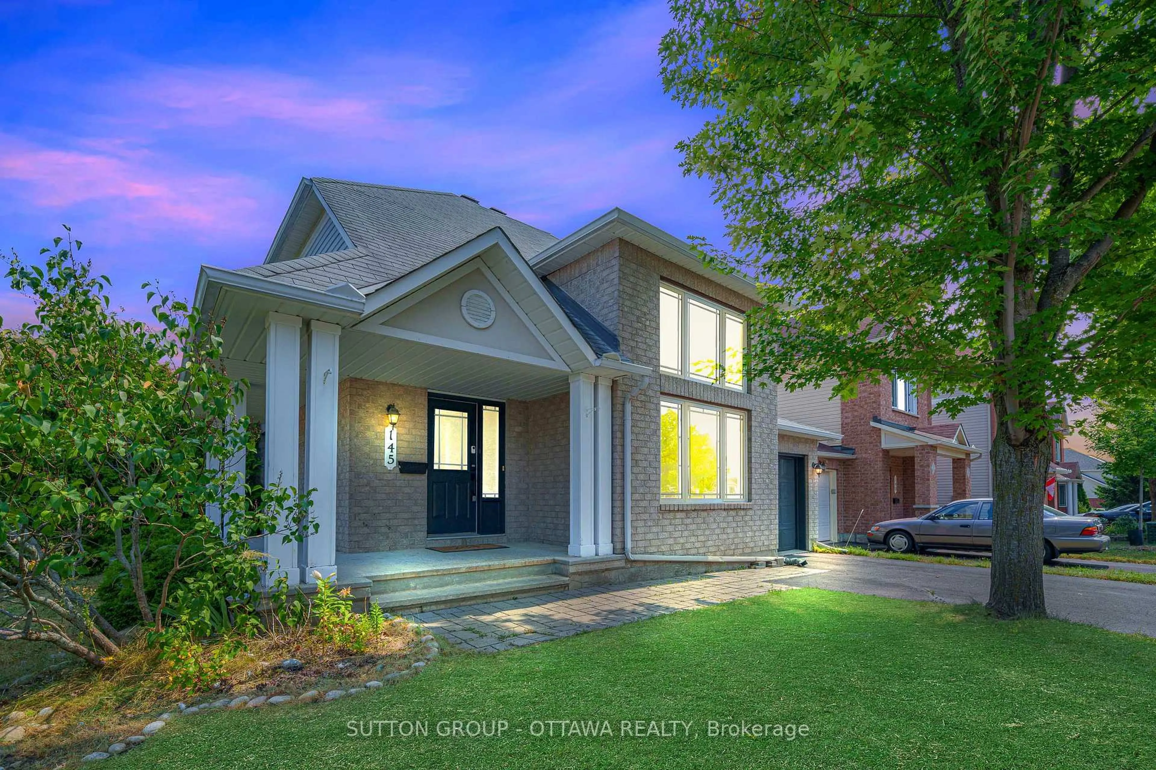 Home with brick exterior material, street for 145 Grovemont Dr, Ottawa Ontario K2G 6Z9