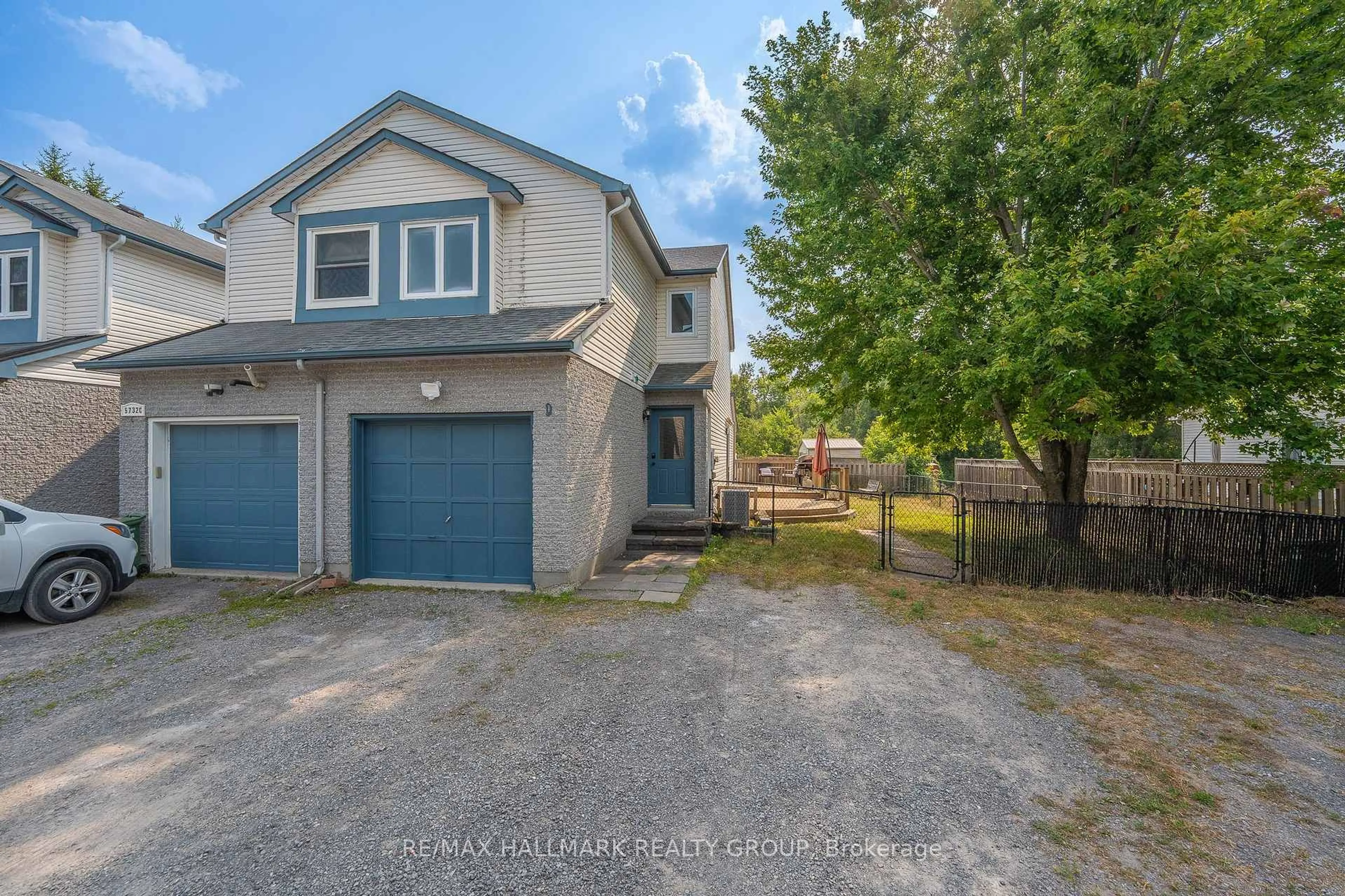 A pic from outside/outdoor area/front of a property/back of a property/a pic from drone, street for 5732 Andrasi Cres #D, Osgoode Ontario K0A 2W0