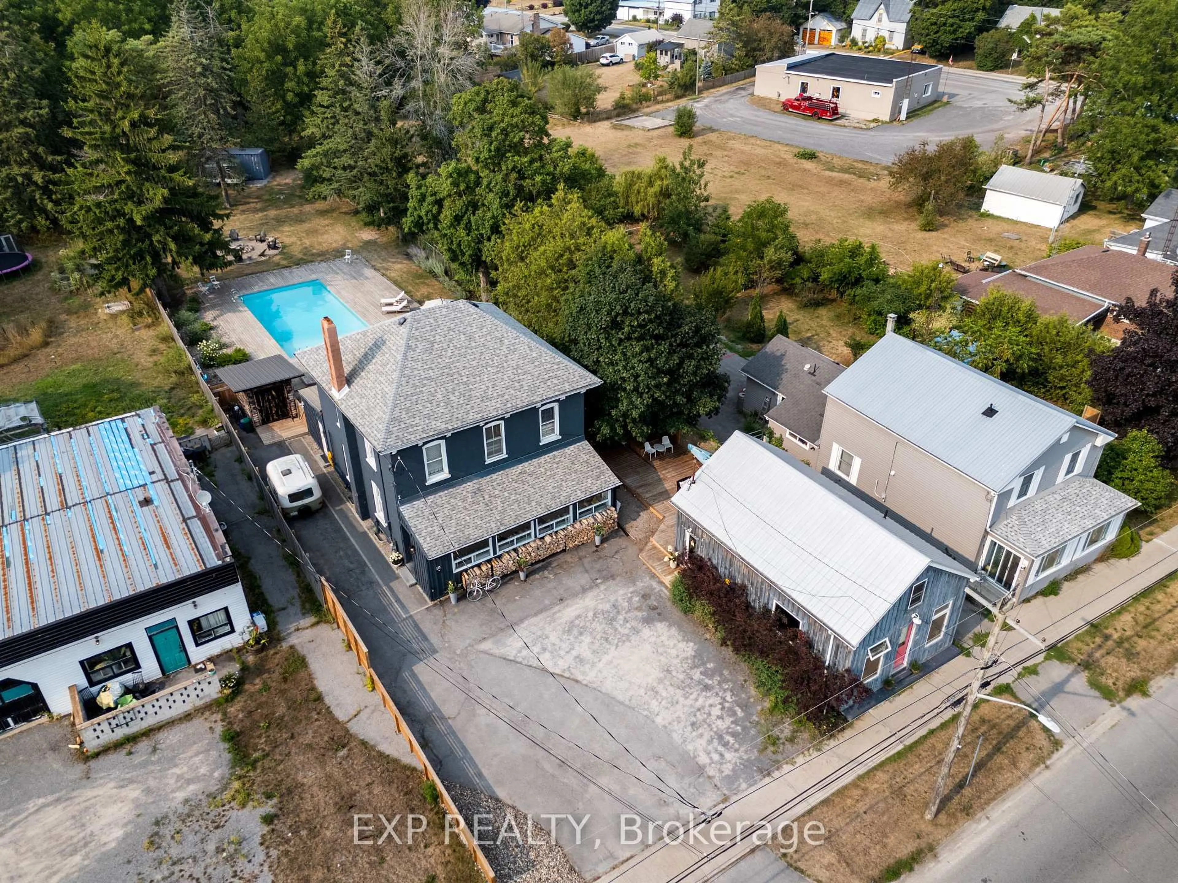 A pic from outside/outdoor area/front of a property/back of a property/a pic from drone, street for 168-170 Main St, Prince Edward County Ontario K0K 3L0