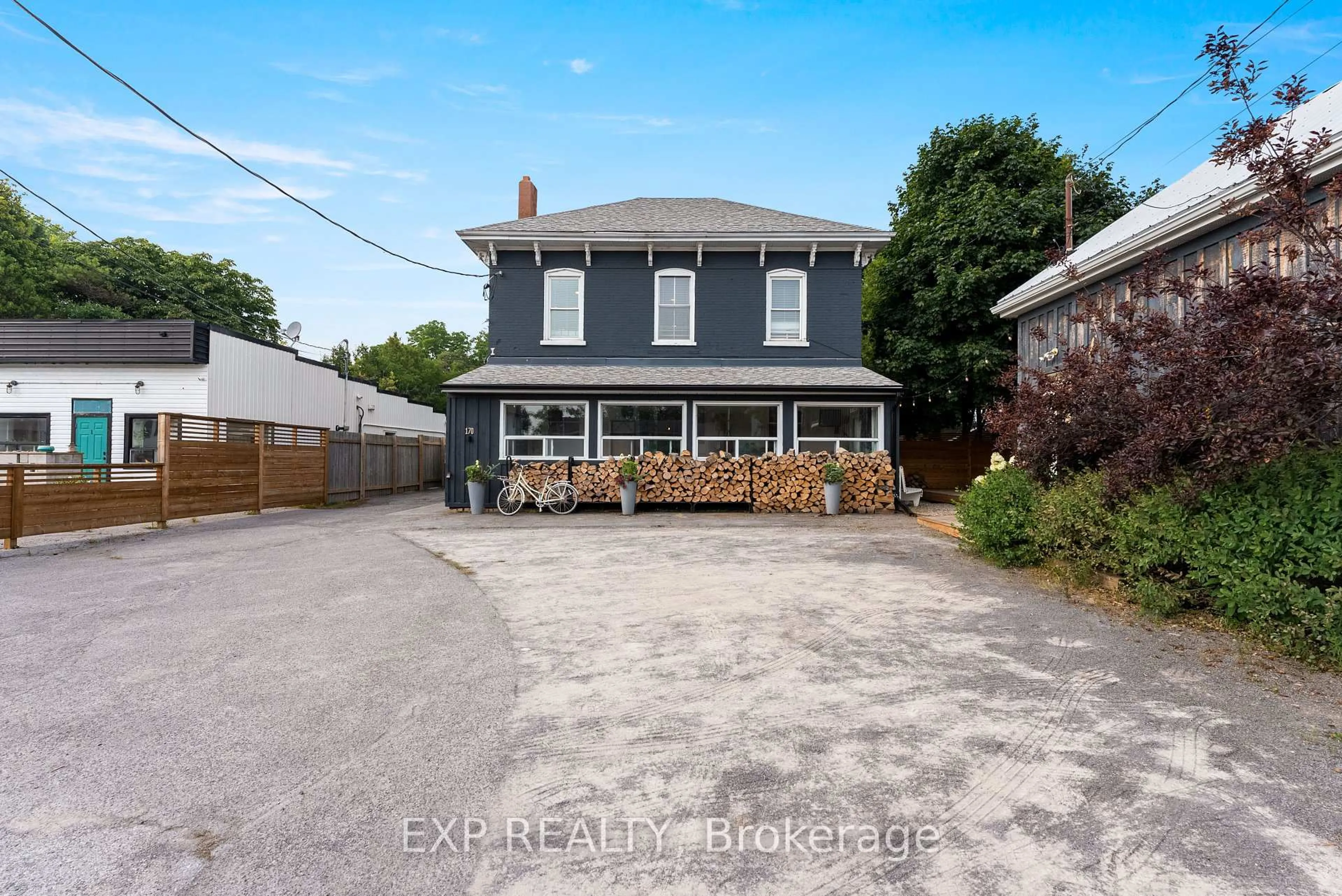 A pic from outside/outdoor area/front of a property/back of a property/a pic from drone, street for 168-170 Main St, Prince Edward County Ontario K0K 3L0
