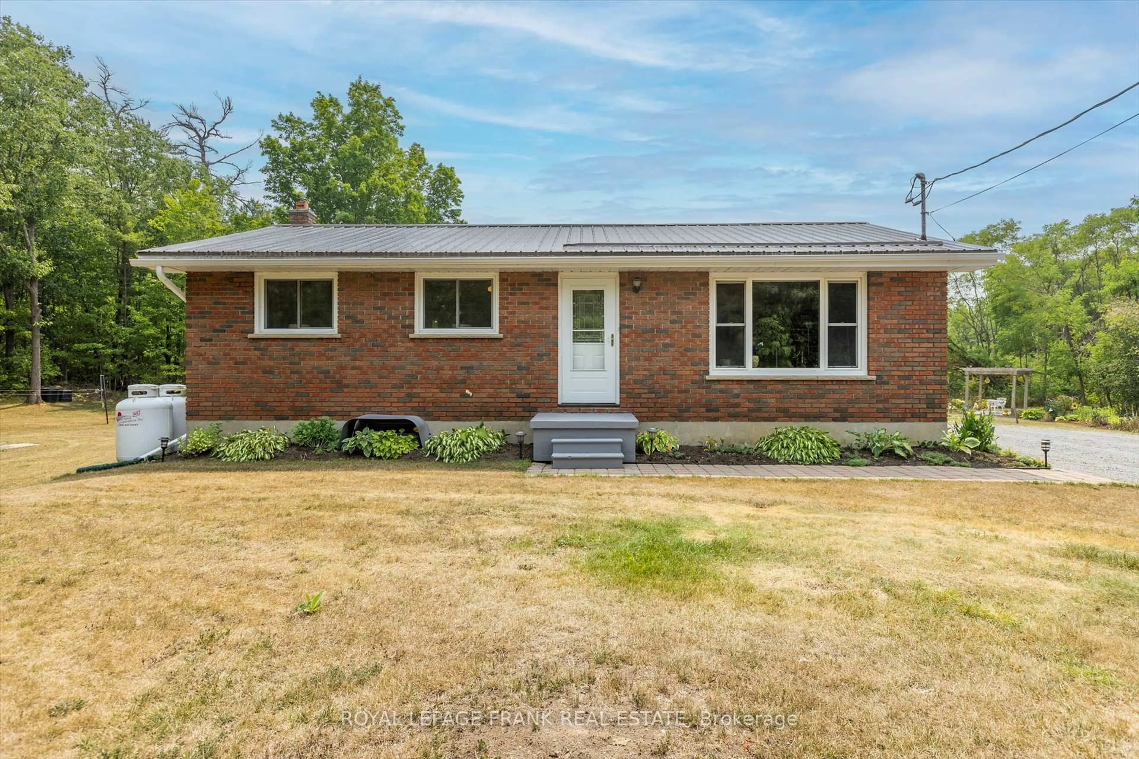 Home with brick exterior material, street for 419 South Beach Rd, Douro-Dummer Ontario K0L 2H0