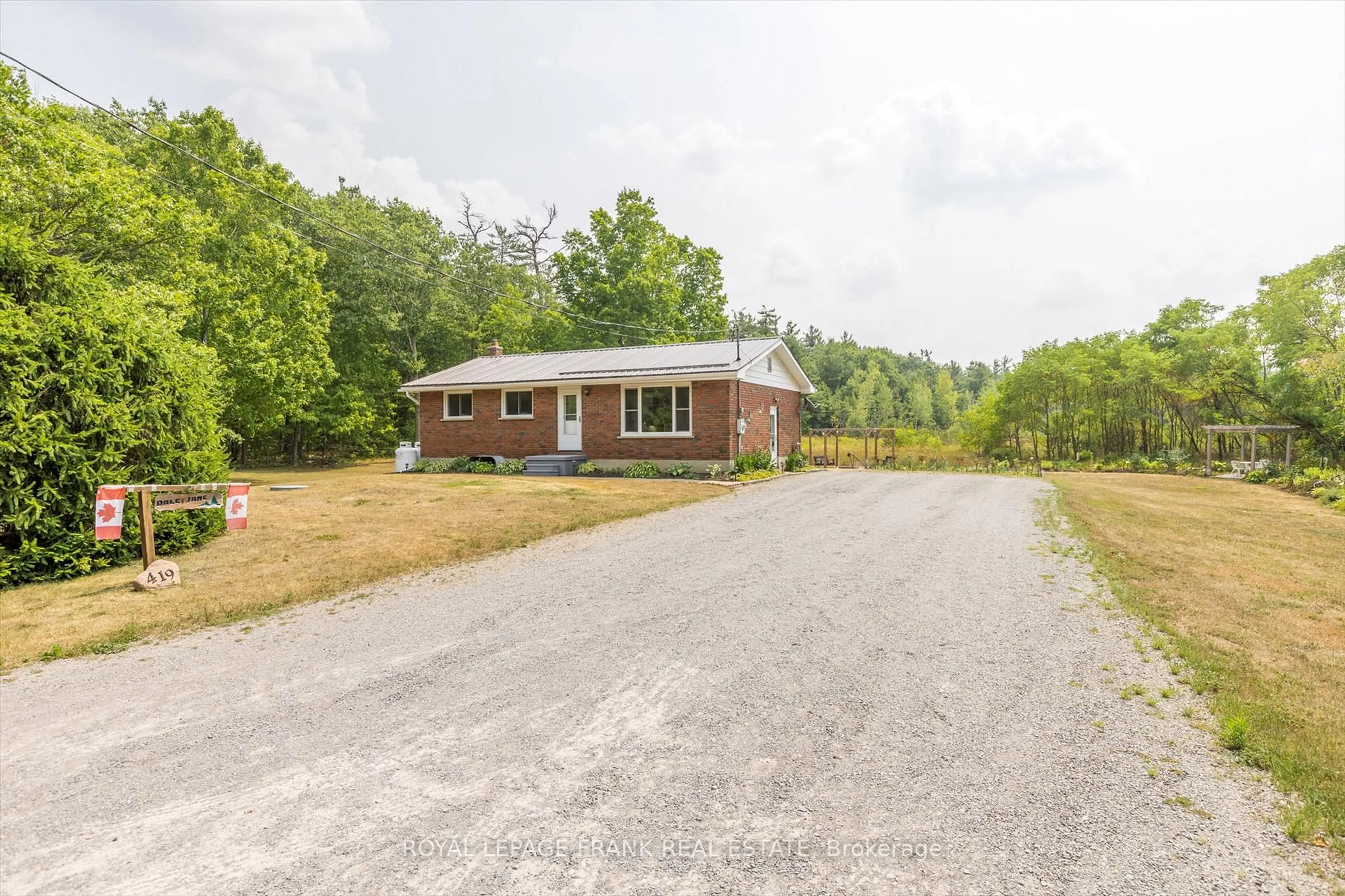 A pic from outside/outdoor area/front of a property/back of a property/a pic from drone, unknown for 419 South Beach Rd, Douro-Dummer Ontario K0L 2H0