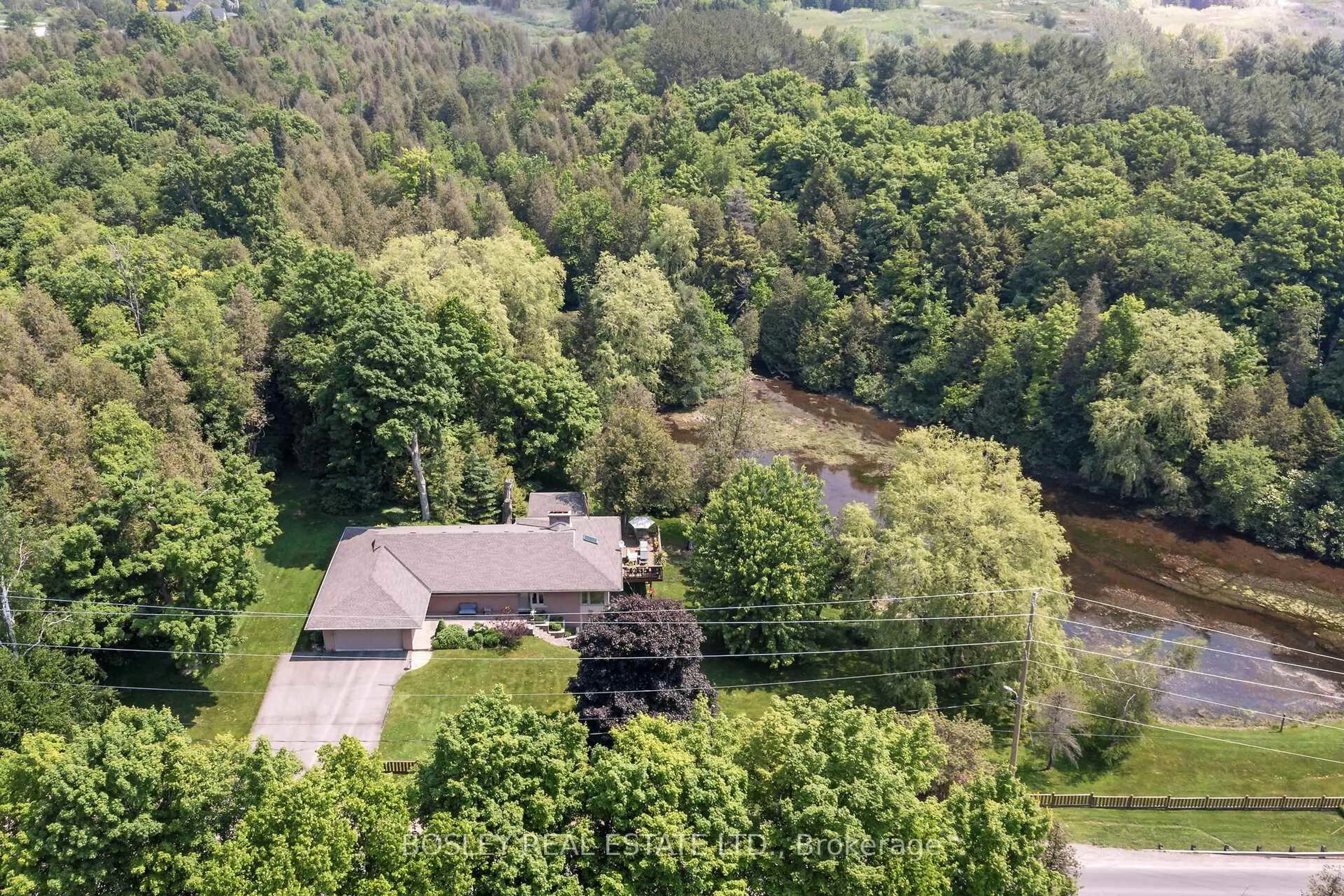 A pic from outside/outdoor area/front of a property/back of a property/a pic from drone, forest/trees view for 5489 10th Line, Erin Ontario N0B 1T0