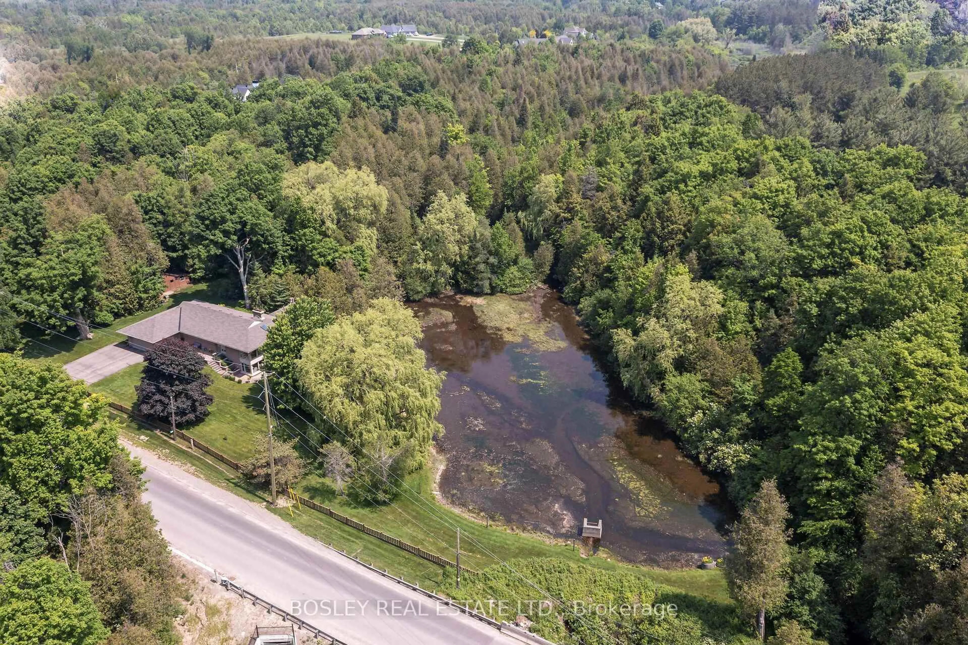 A pic from outside/outdoor area/front of a property/back of a property/a pic from drone, water/lake/river/ocean view for 5489 10th Line, Erin Ontario N0B 1T0