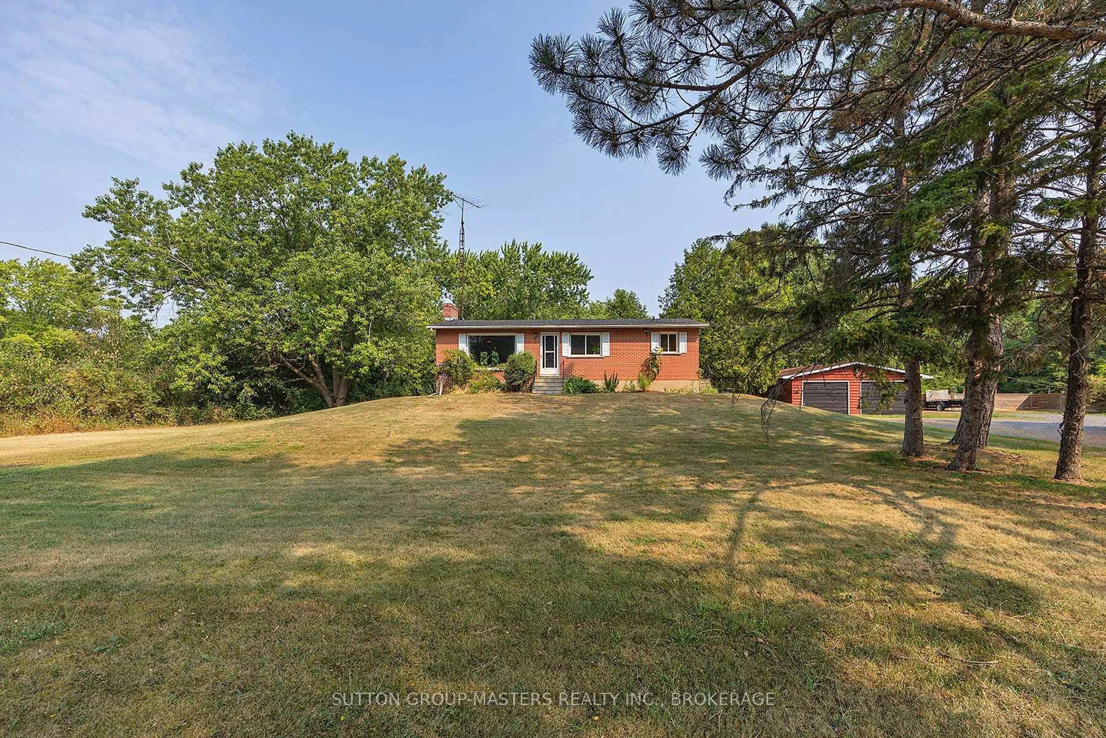 A pic from outside/outdoor area/front of a property/back of a property/a pic from drone, unknown for 3896 Highway 15, Kingston Ontario K0H 1Y0