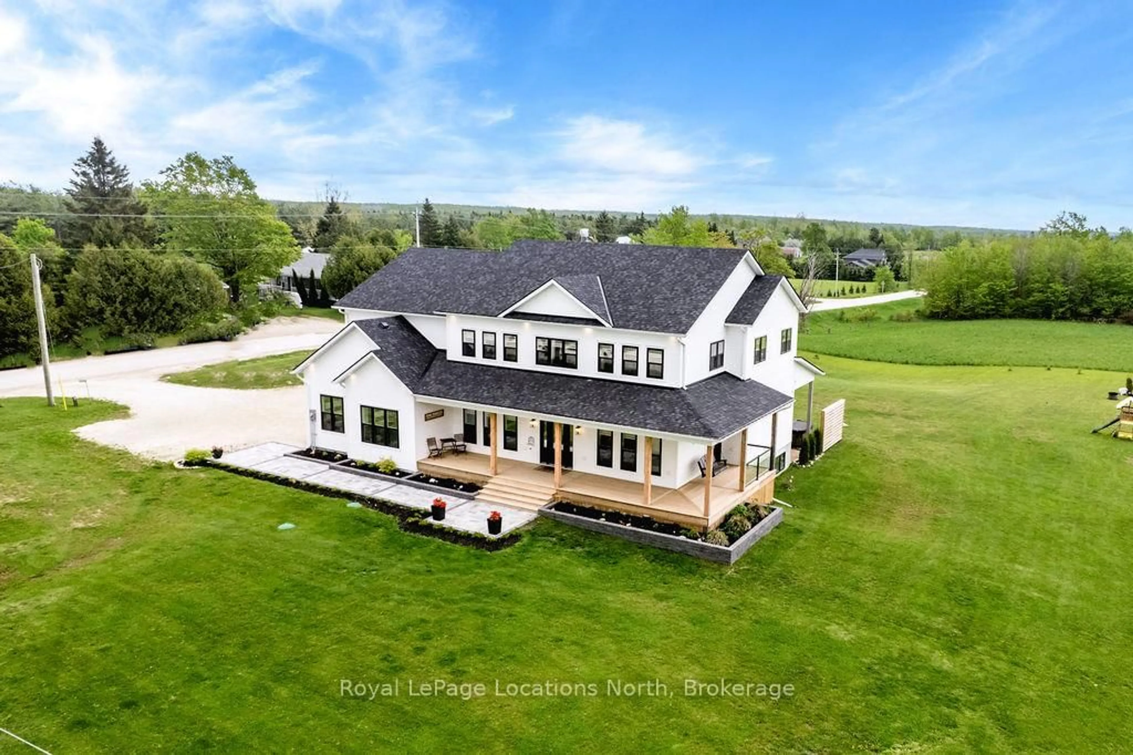 A pic from outside/outdoor area/front of a property/back of a property/a pic from drone, unknown for 595366 4TH Line, Blue Mountains Ontario N0H 2E0