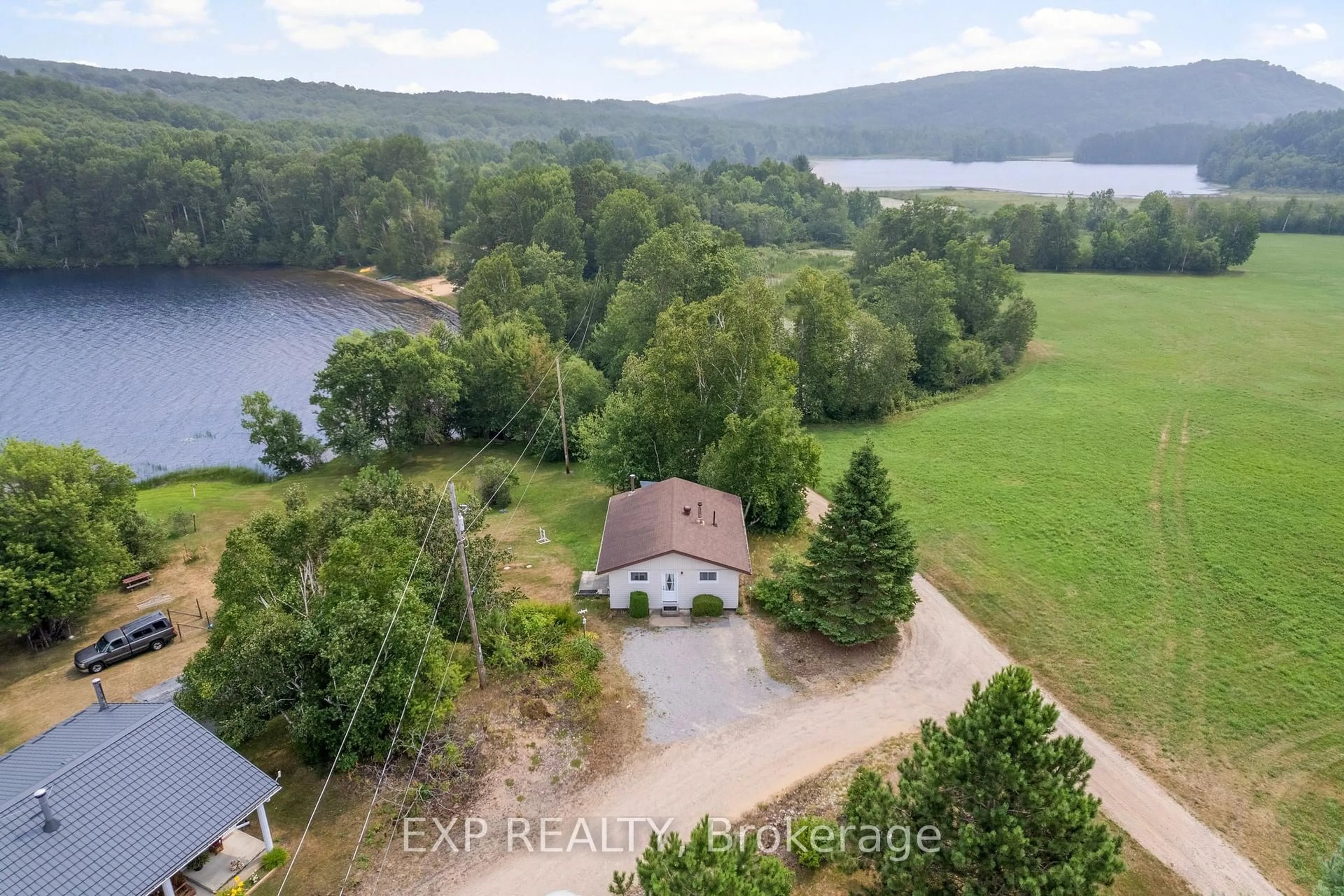 A pic from outside/outdoor area/front of a property/back of a property/a pic from drone, water/lake/river/ocean view for 328 Horseshoe Lane, Barry's Bay Ontario K0J 1B0