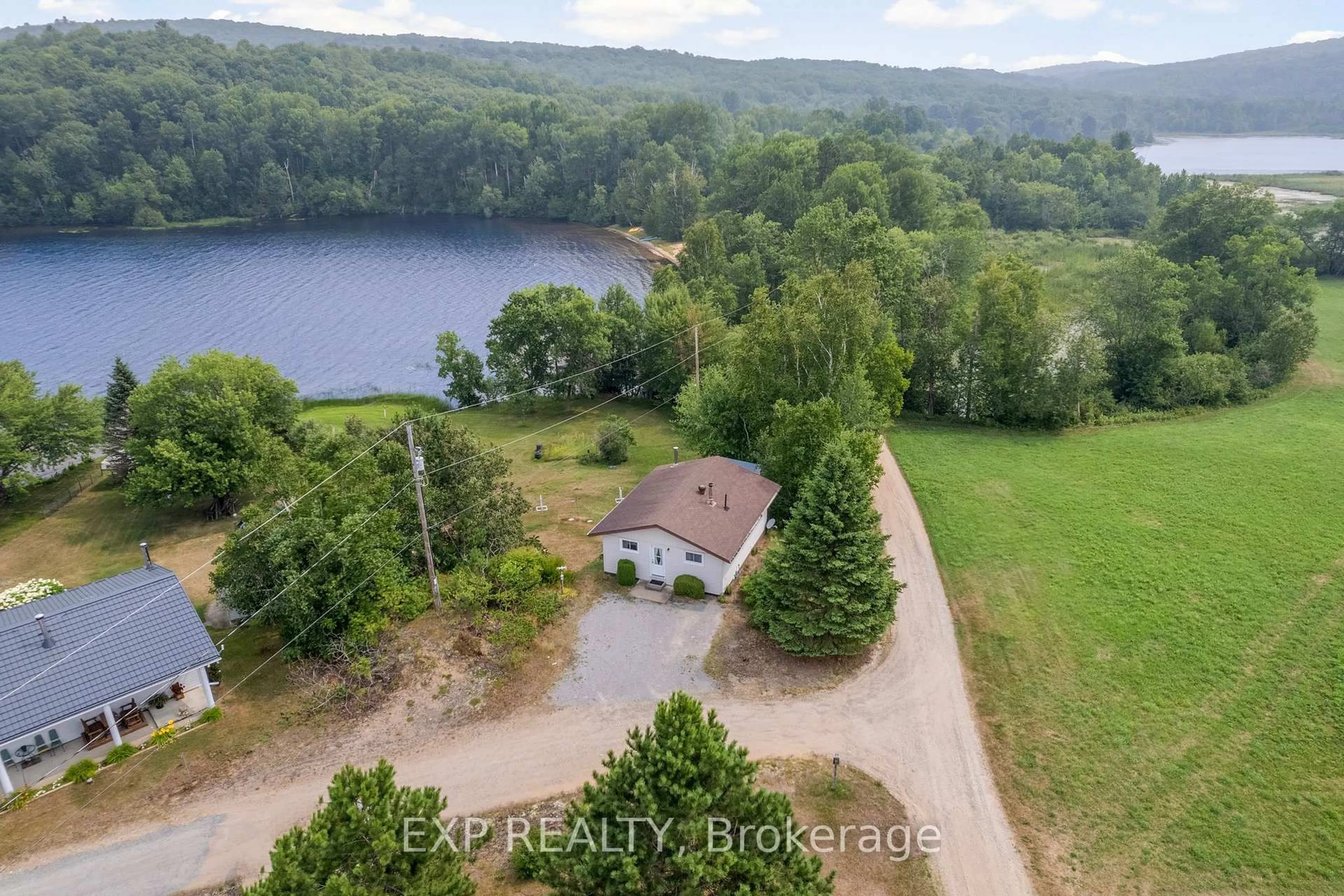 A pic from outside/outdoor area/front of a property/back of a property/a pic from drone, water/lake/river/ocean view for 328 Horseshoe Lane, Barry's Bay Ontario K0J 1B0