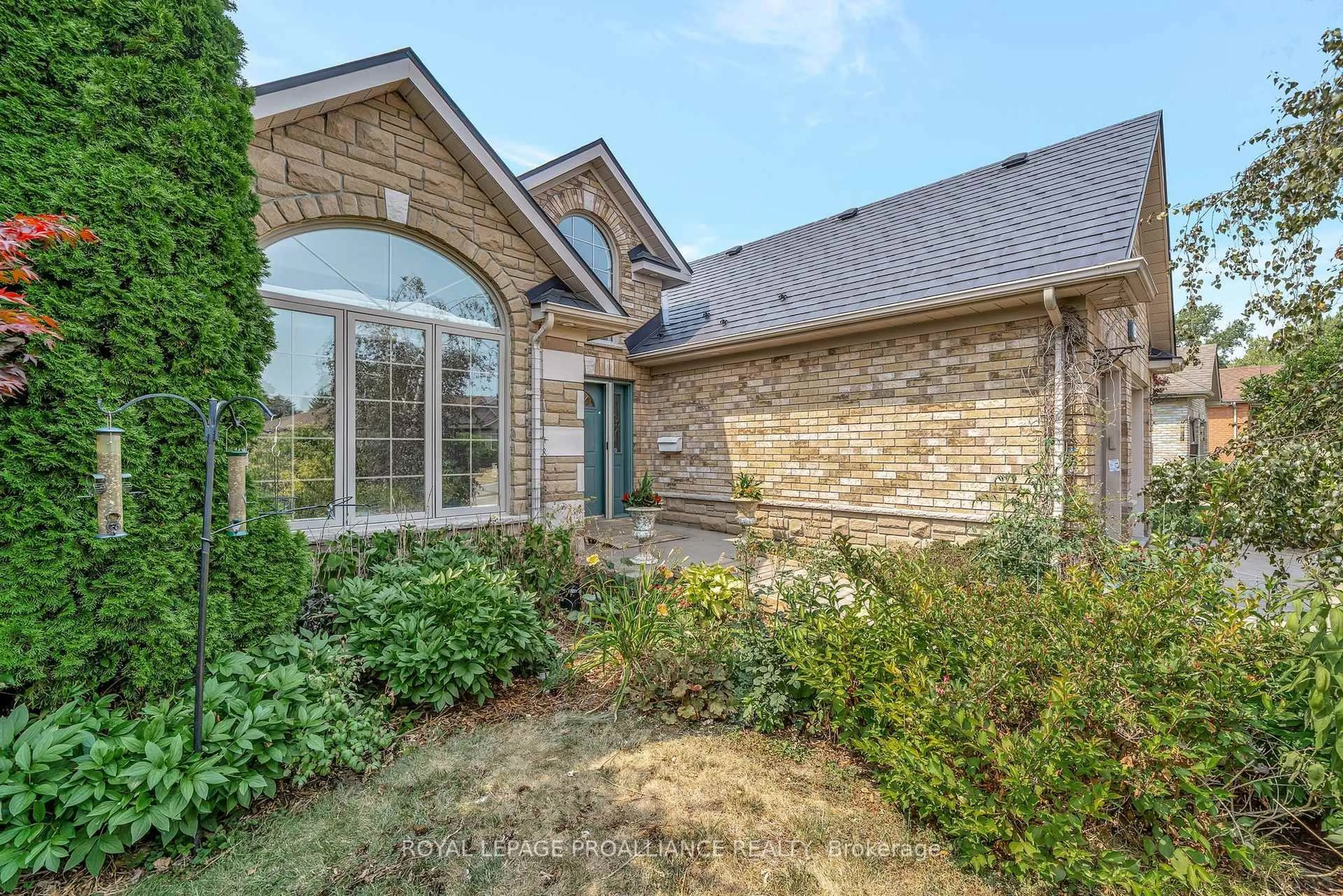 Home with brick exterior material, street for 82 HEARTWOOD Dr, Belleville Ontario K8P 5M5