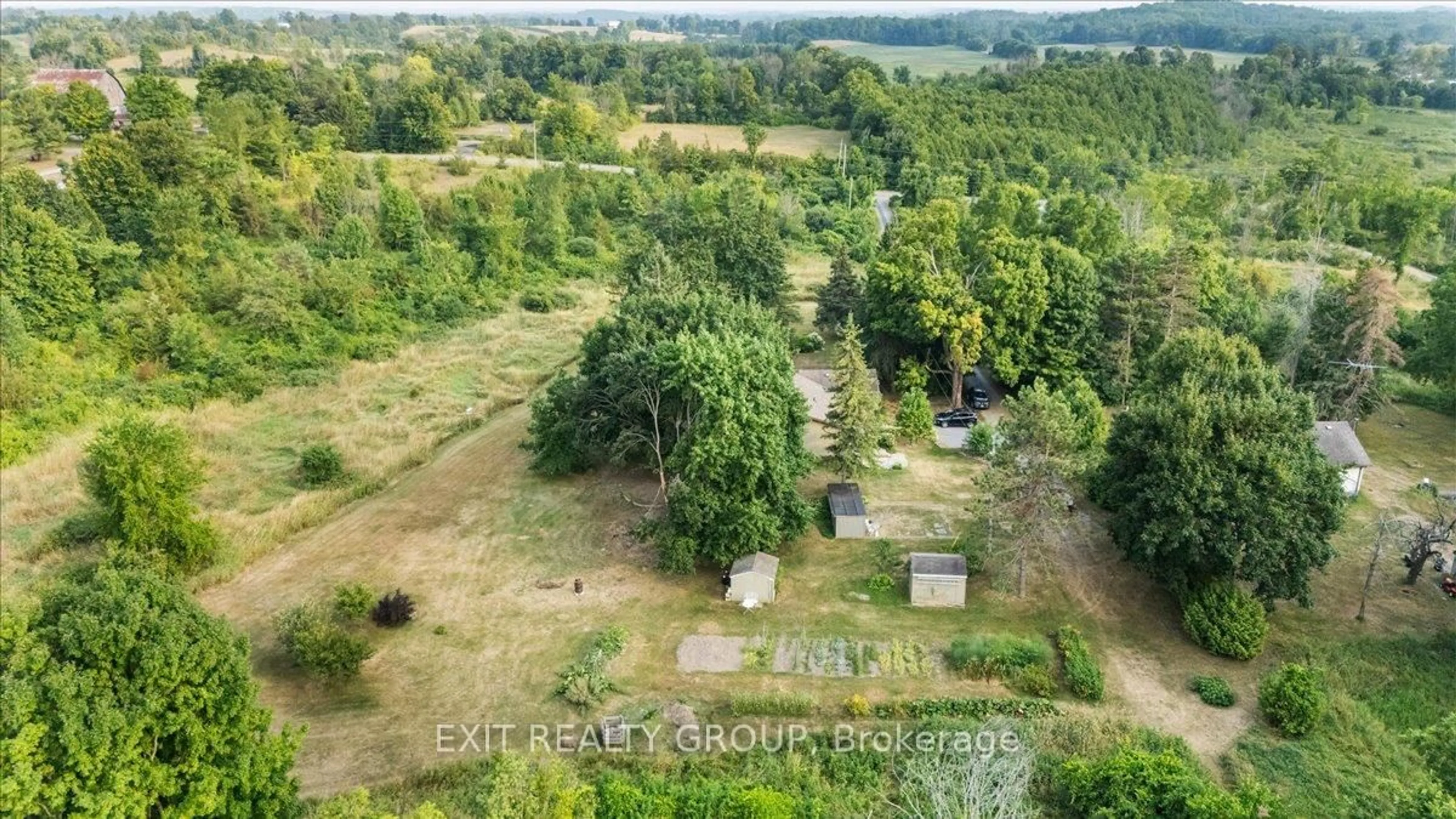 A pic from outside/outdoor area/front of a property/back of a property/a pic from drone, forest/trees view for 200 A Boundary Rd, Belleville Ontario K0K 2Y0