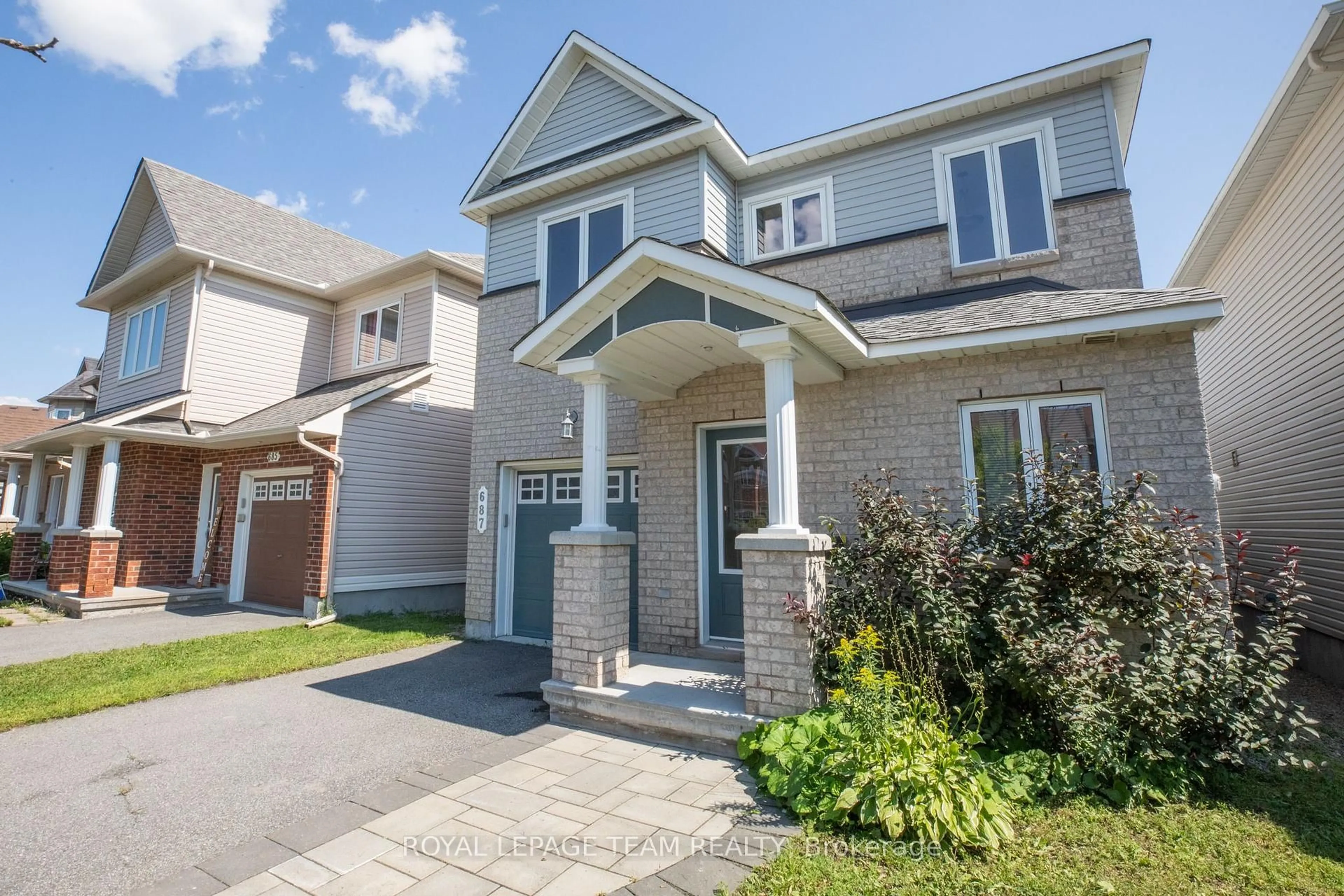 Home with brick exterior material, street for 687 Paul Metivier Dr, Ottawa Ontario K2J 2T4