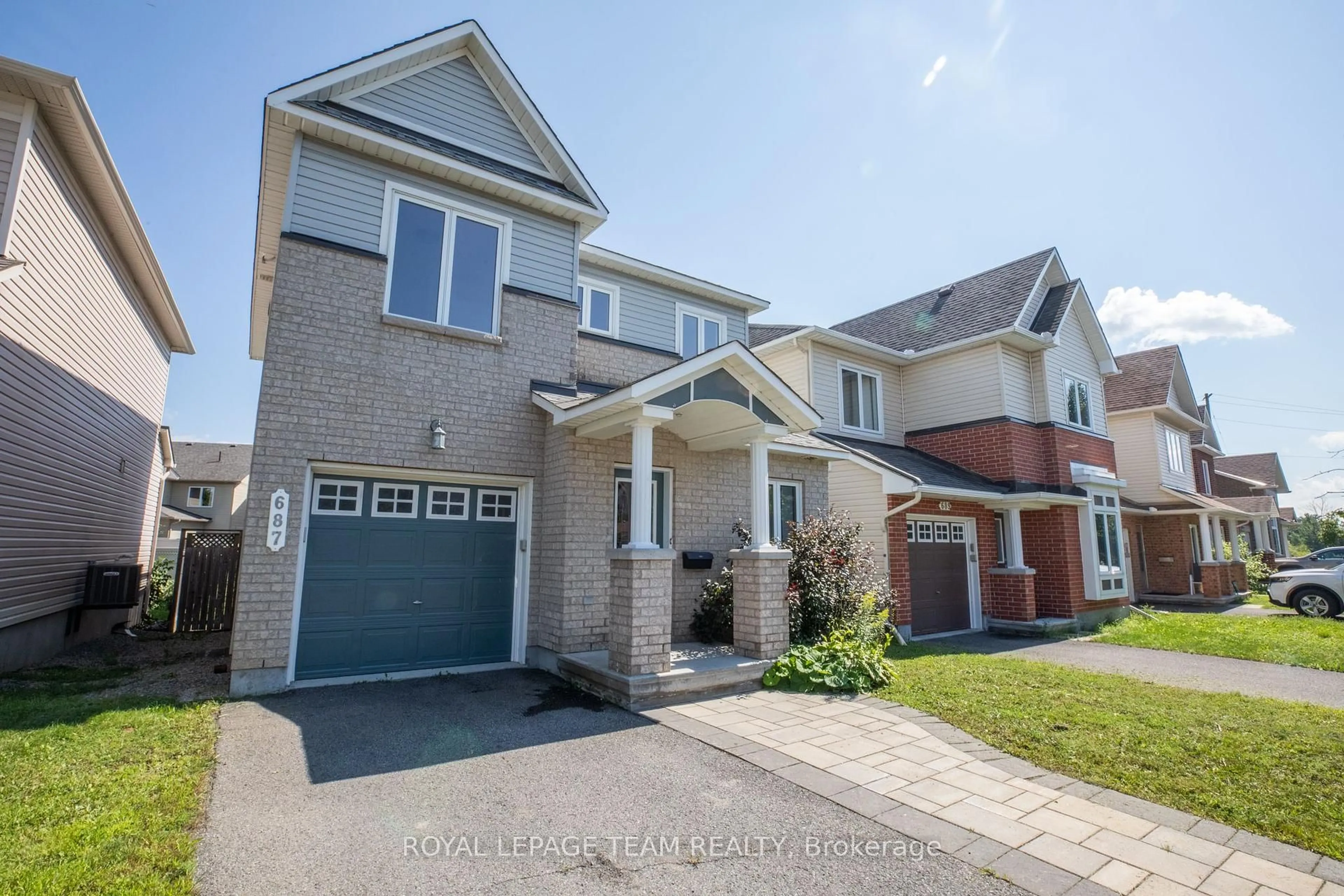 Home with brick exterior material, street for 687 Paul Metivier Dr, Ottawa Ontario K2J 2T4