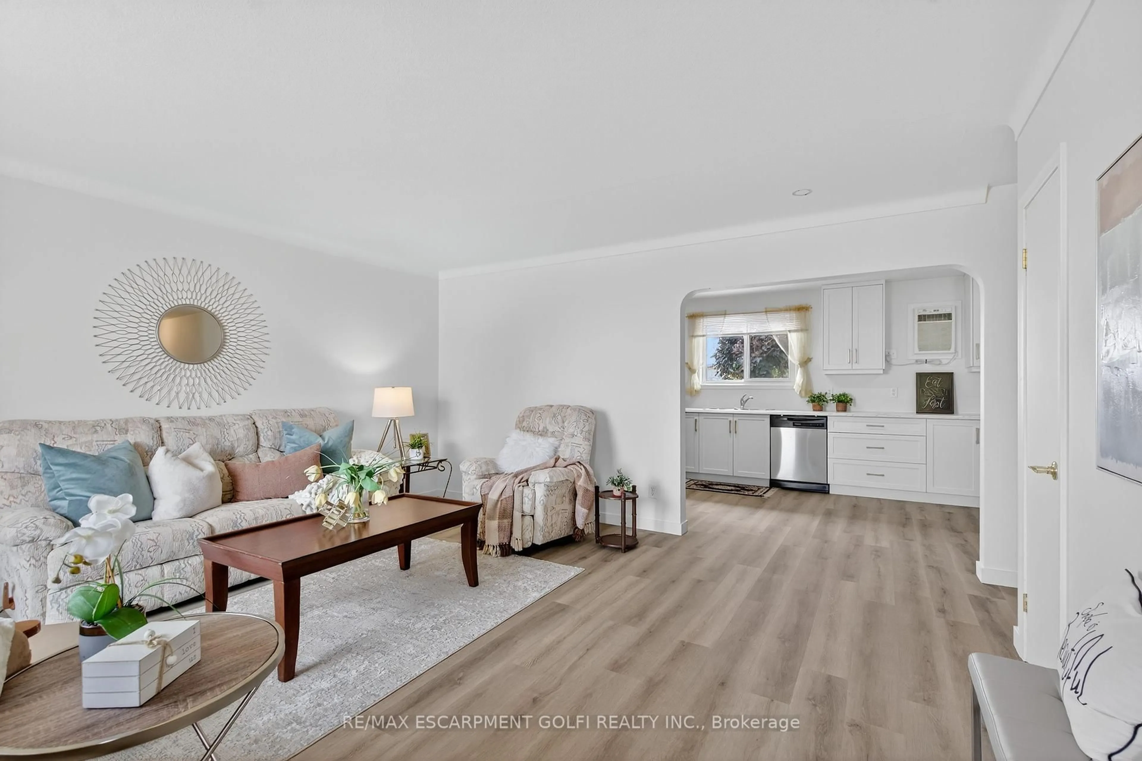 Living room with furniture, wood/laminate floor for 2041 Third Street Louth, St. Catharines Ontario L2S 6P9