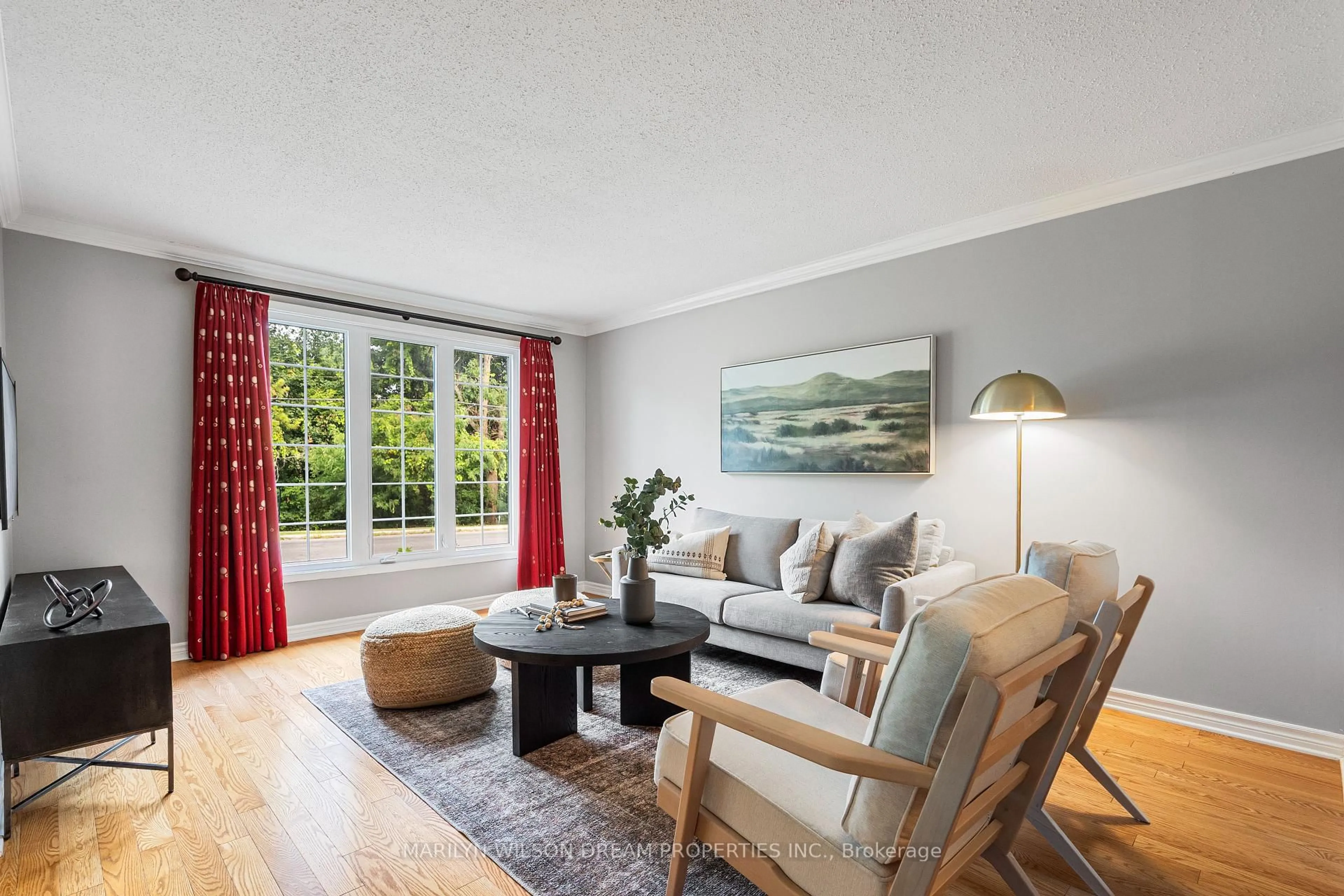 Living room with furniture, wood/laminate floor for 3346 Albion Rd #34, Ottawa Ontario K1V 8V5