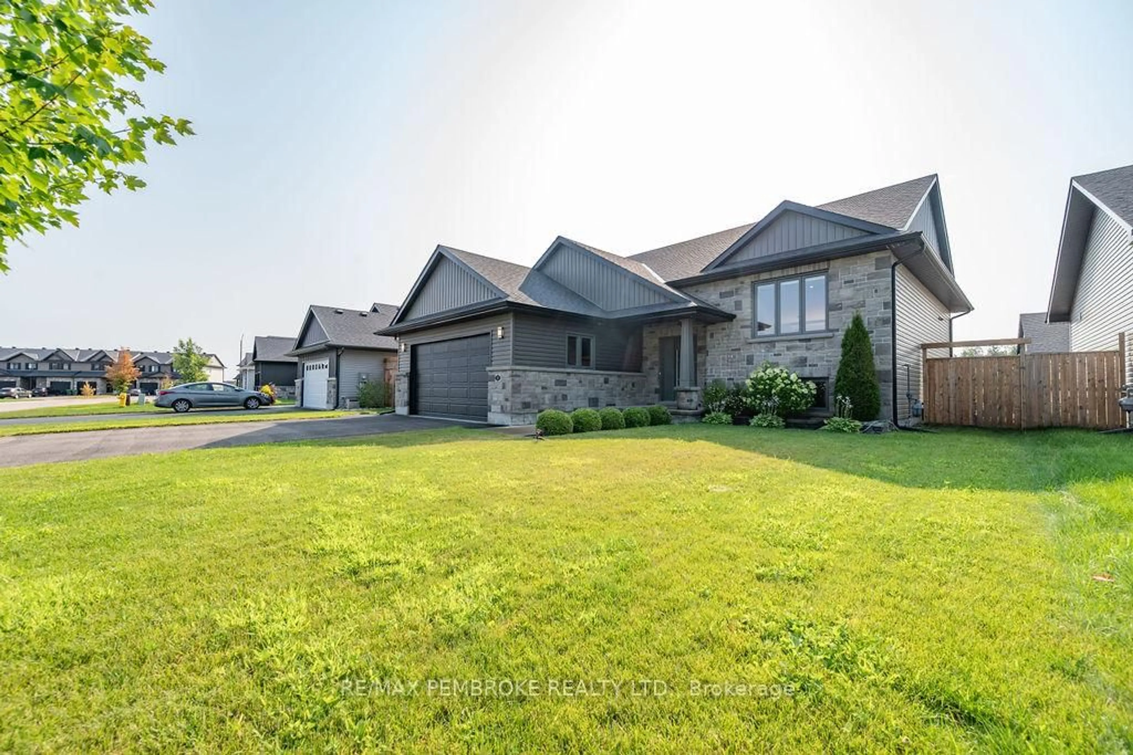 A pic from outside/outdoor area/front of a property/back of a property/a pic from drone, street for 13 Drew St, Petawawa Ontario K8H 0G4