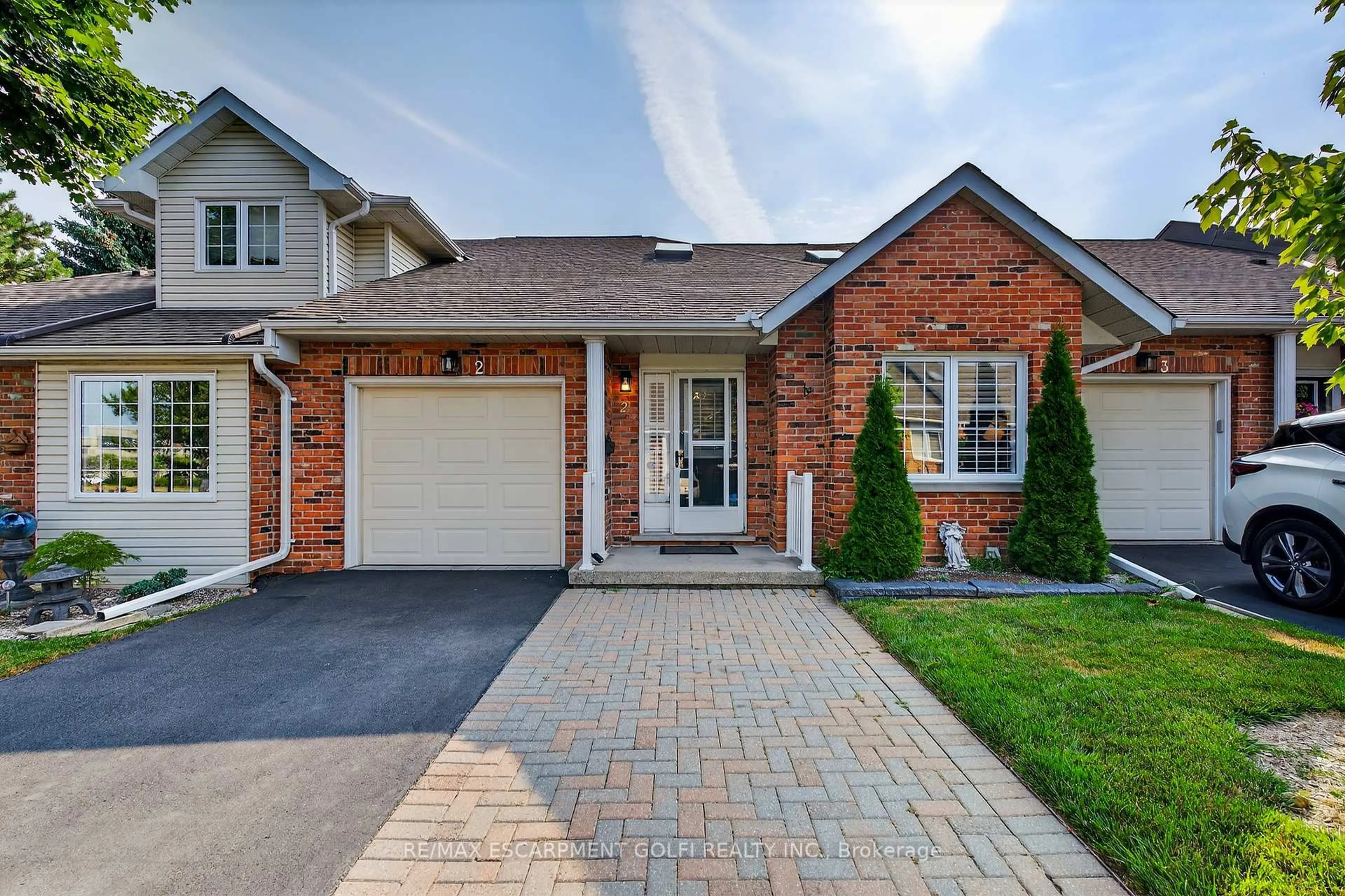 Home with brick exterior material, street for 810 Golf Links Rd #2, Hamilton Ontario L9K 1J7