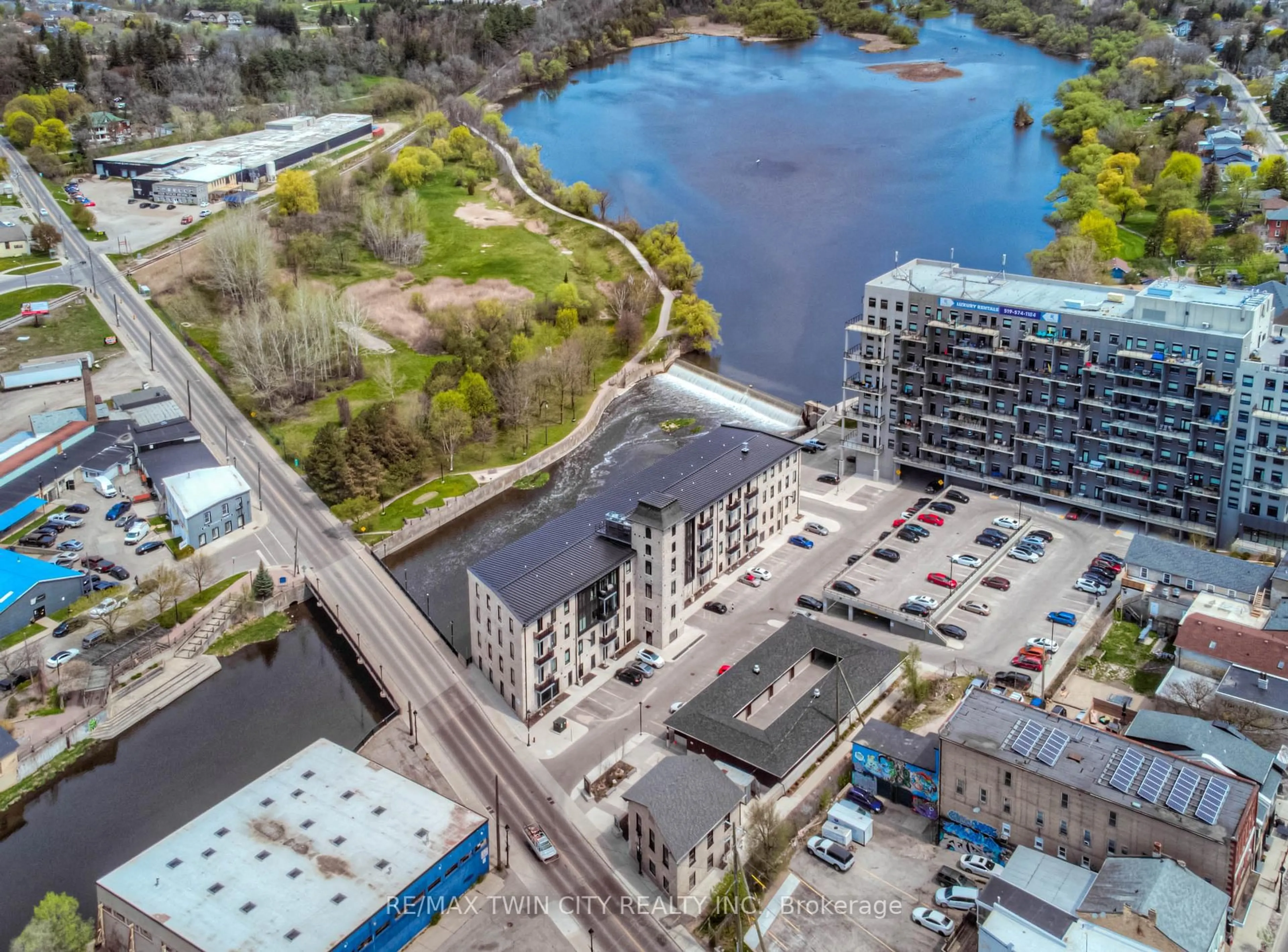 A pic from outside/outdoor area/front of a property/back of a property/a pic from drone, water/lake/river/ocean view for 19 Guelph Ave #107, Cambridge Ontario N3C 1A2