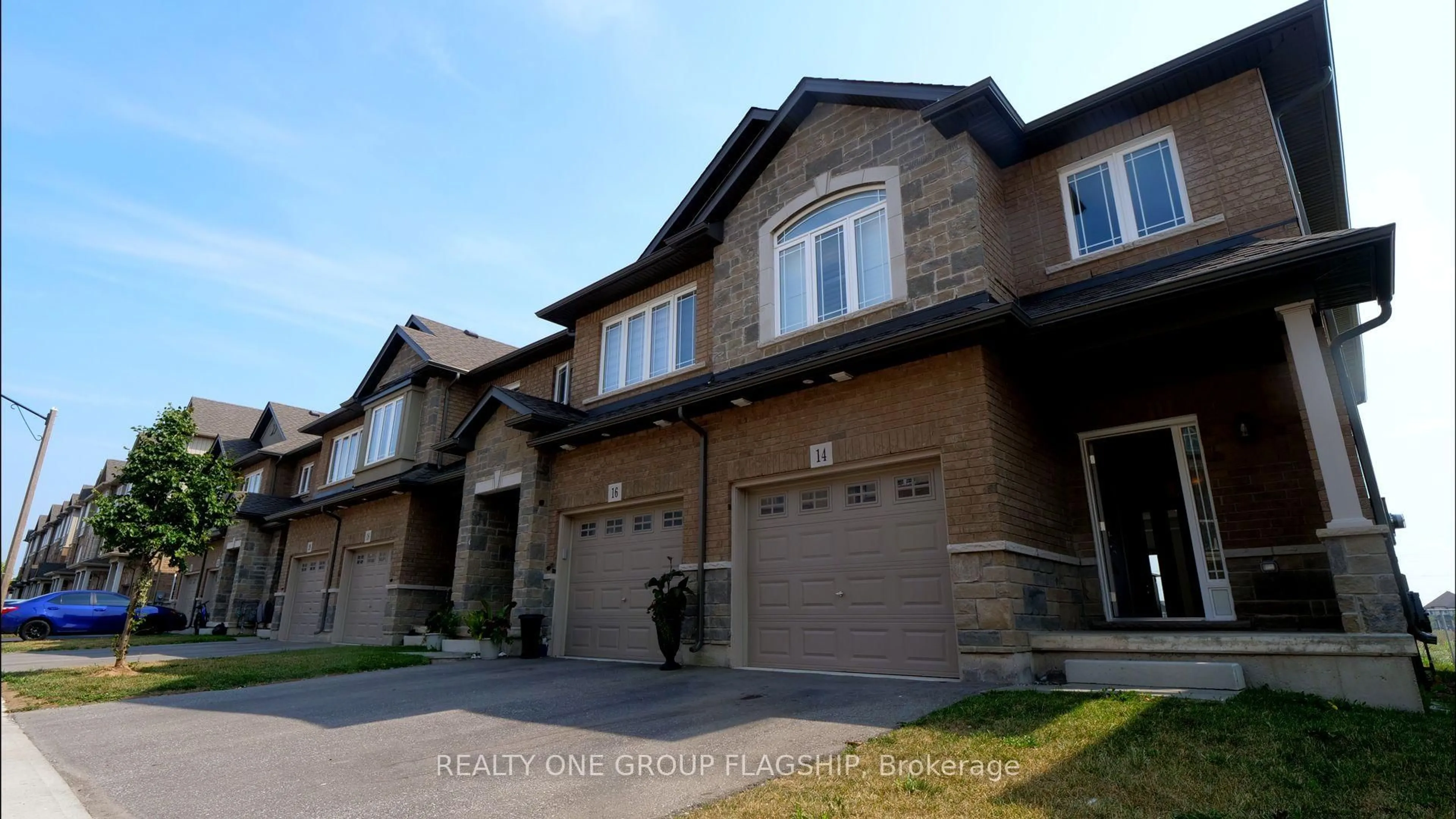 Home with brick exterior material, street for 14 Laguna Village Cres #14, Hamilton Ontario L8E 3M8