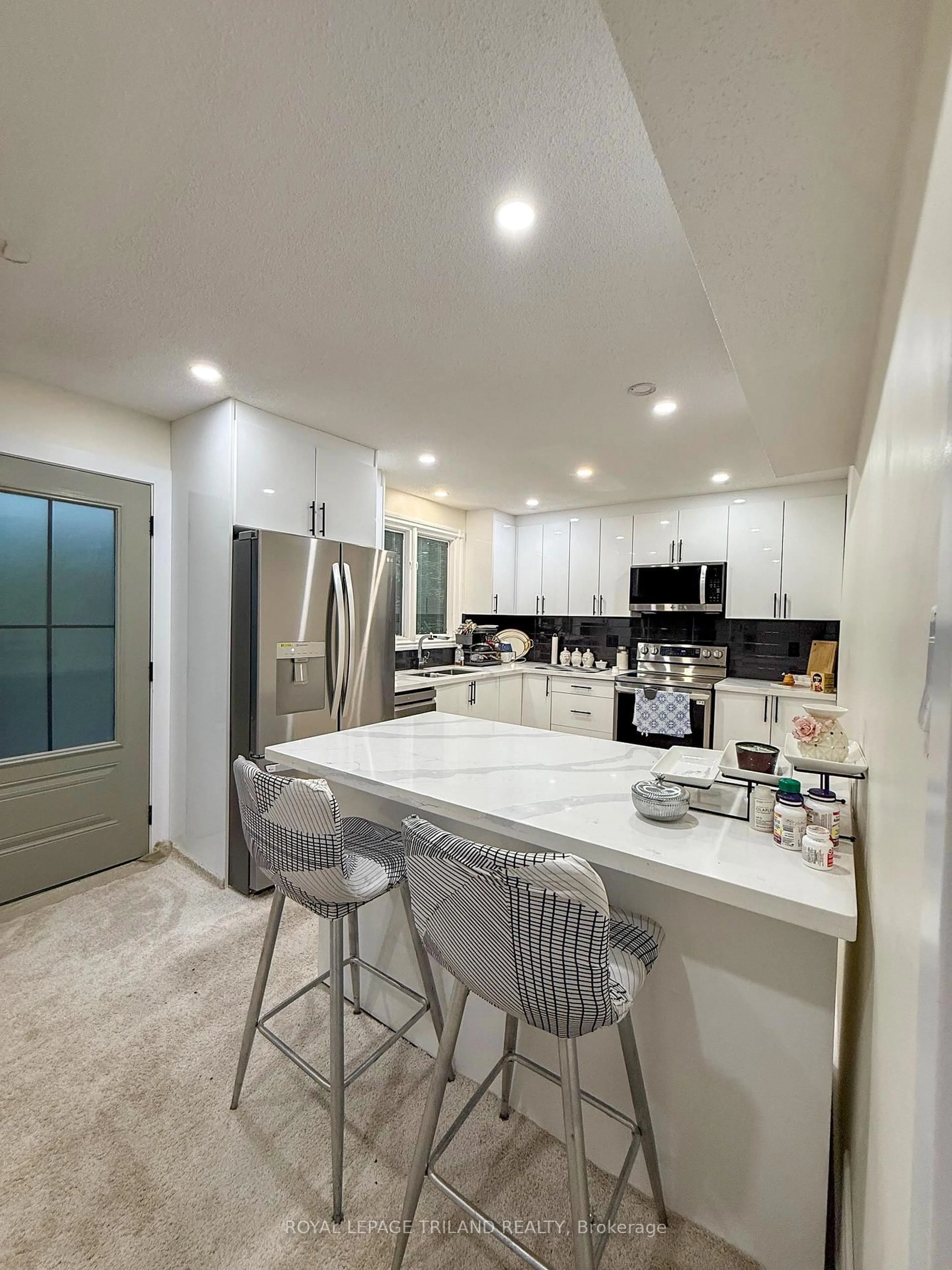 Open concept kitchen, ceramic/tile floor for 11 Crabtree Ave, London North Ontario N6G 2H6