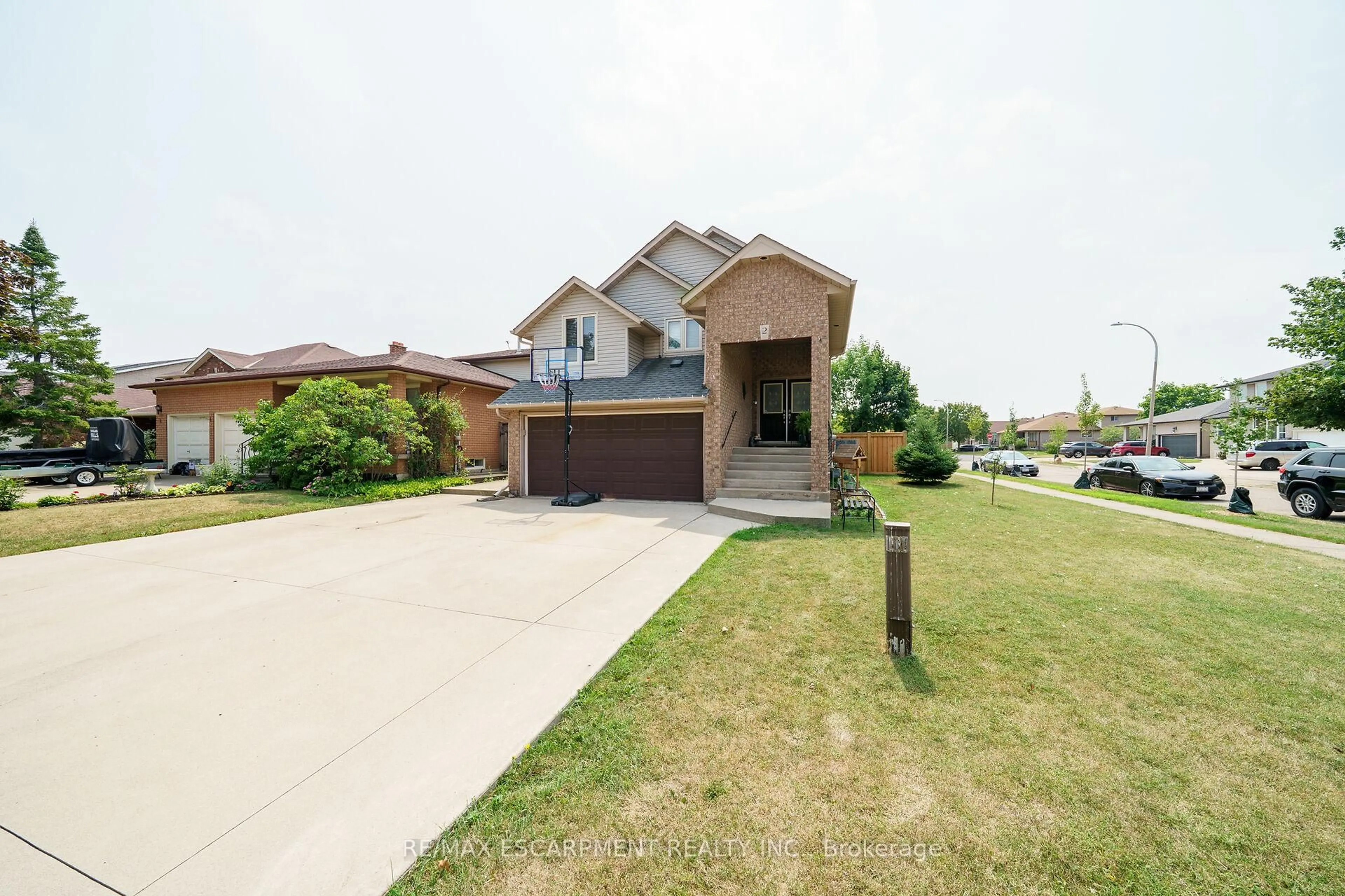 Home with brick exterior material, street for 2 Tyler Dr, Hamilton Ontario L8E 4W9