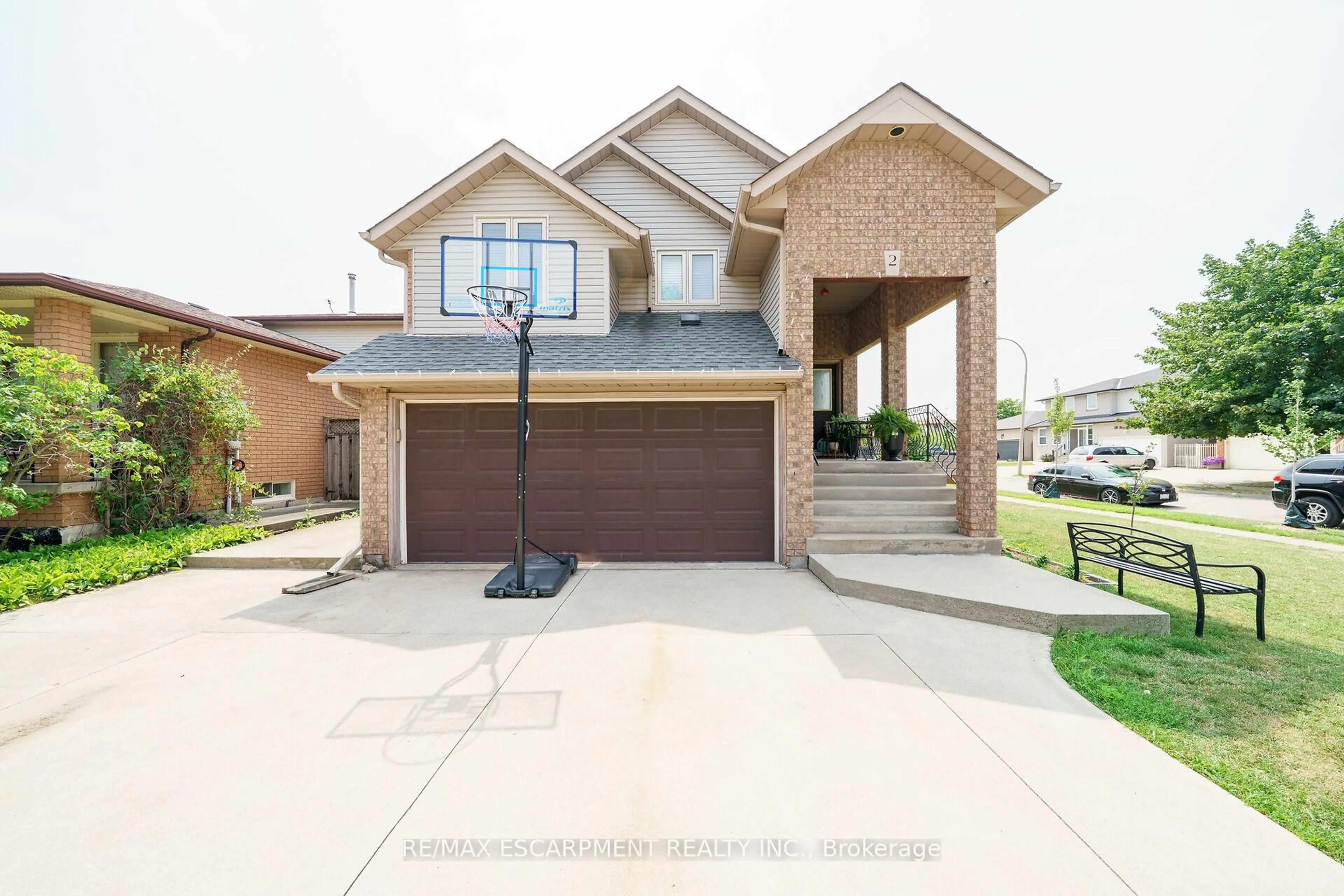 Home with brick exterior material, street for 2 Tyler Dr, Hamilton Ontario L8E 4W9
